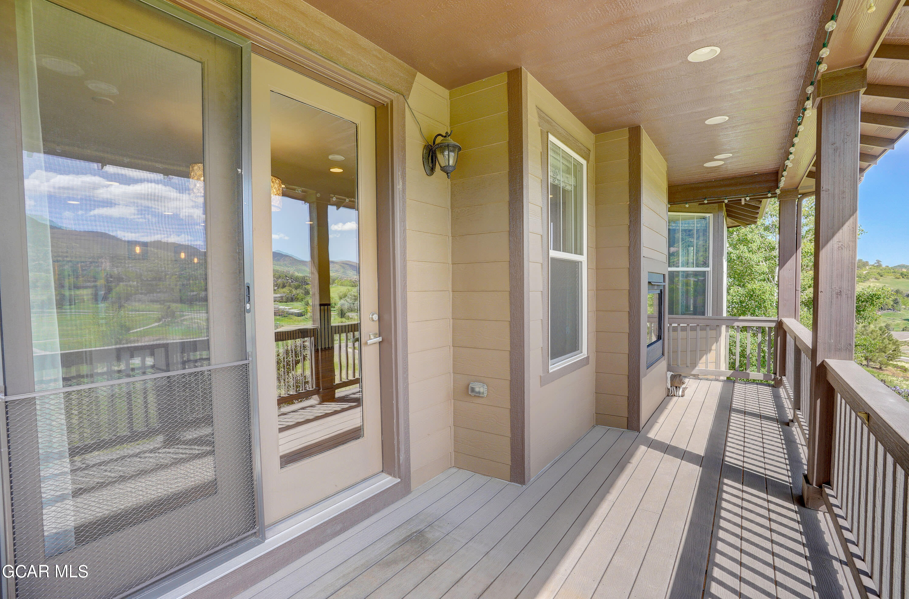 15526 Red Deer Drive Morrison, CO 80465 - Photo 55 of 82 a view of a glass door with a glass door