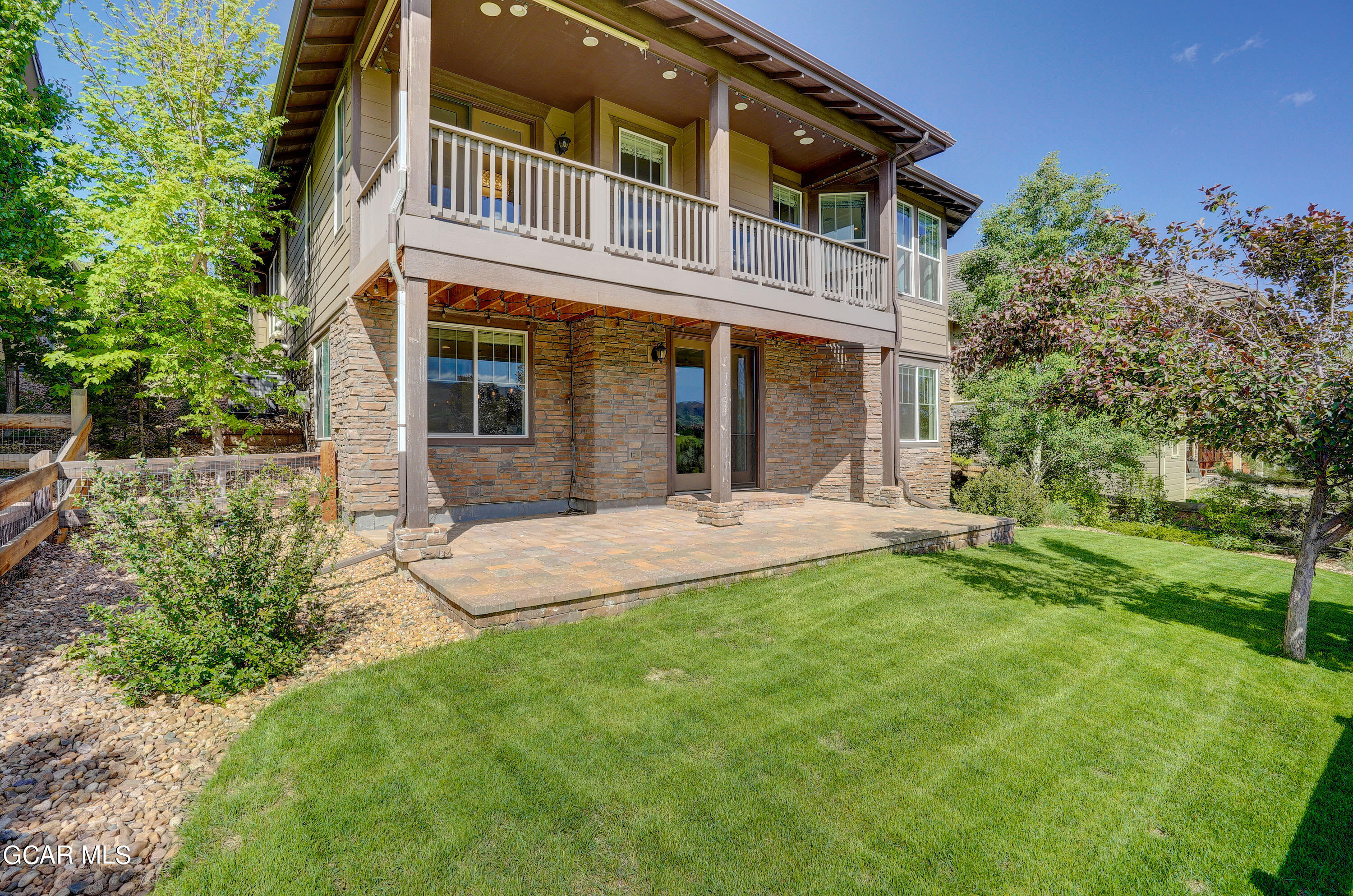 15526 Red Deer Drive Morrison, CO 80465 - Photo 61 of 82 a front view of a house with a yard and porch
