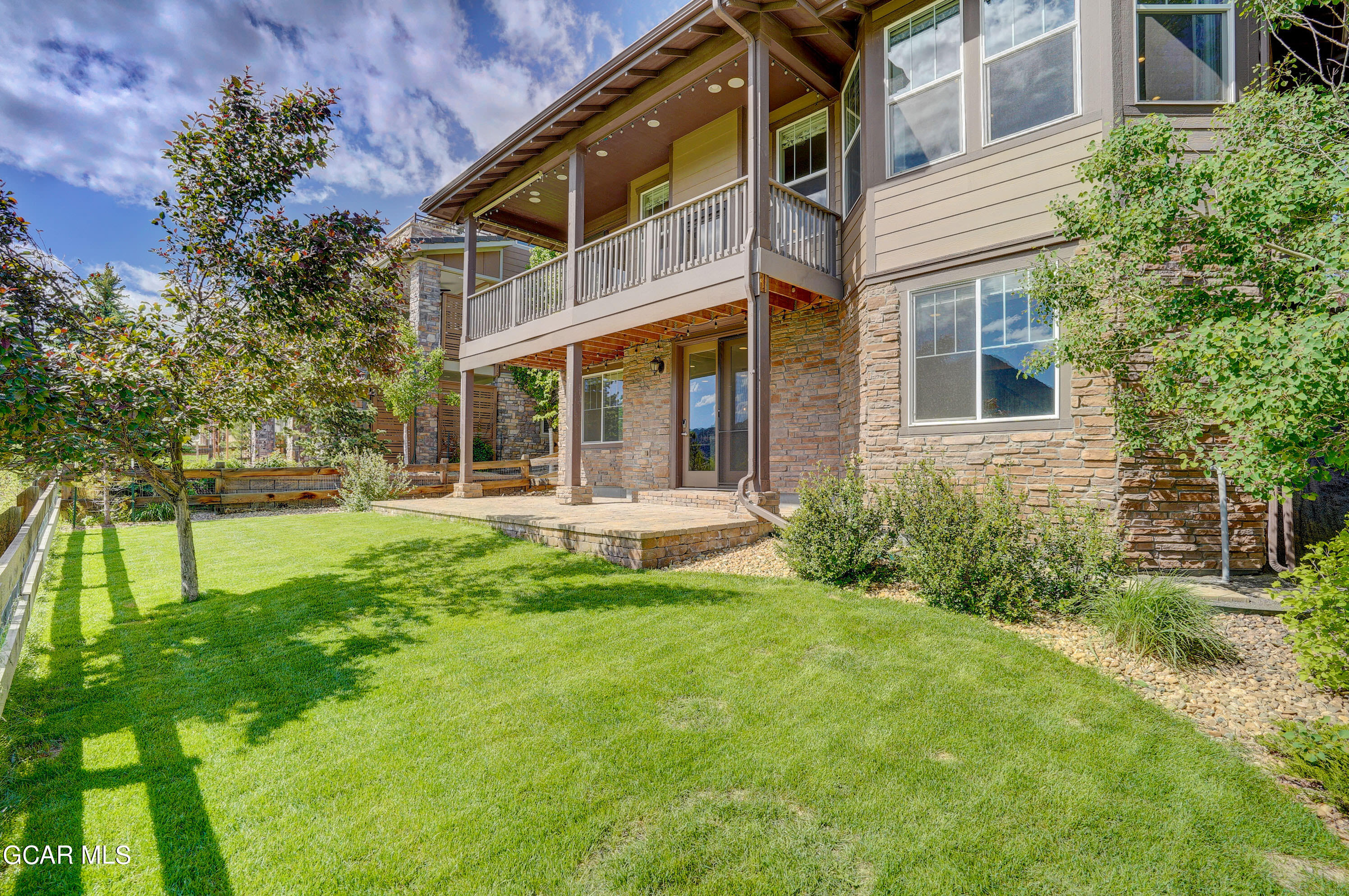 15526 Red Deer Drive Morrison, CO 80465 - Photo 62 of 82 a view of a building with a yard