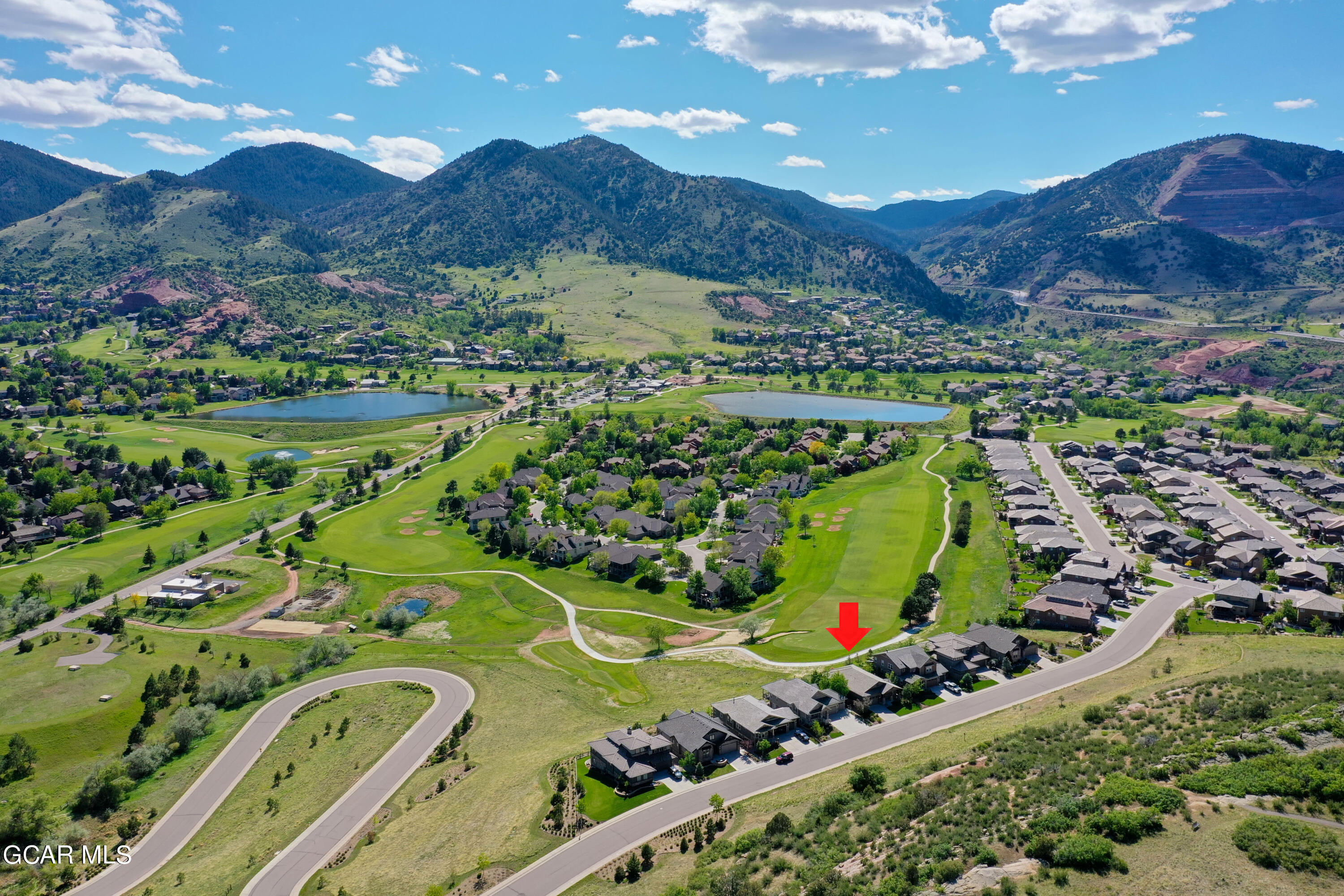 15526 Red Deer Drive Morrison, CO 80465 - Photo 79 of 82 a view of a lush green hillside and houses
