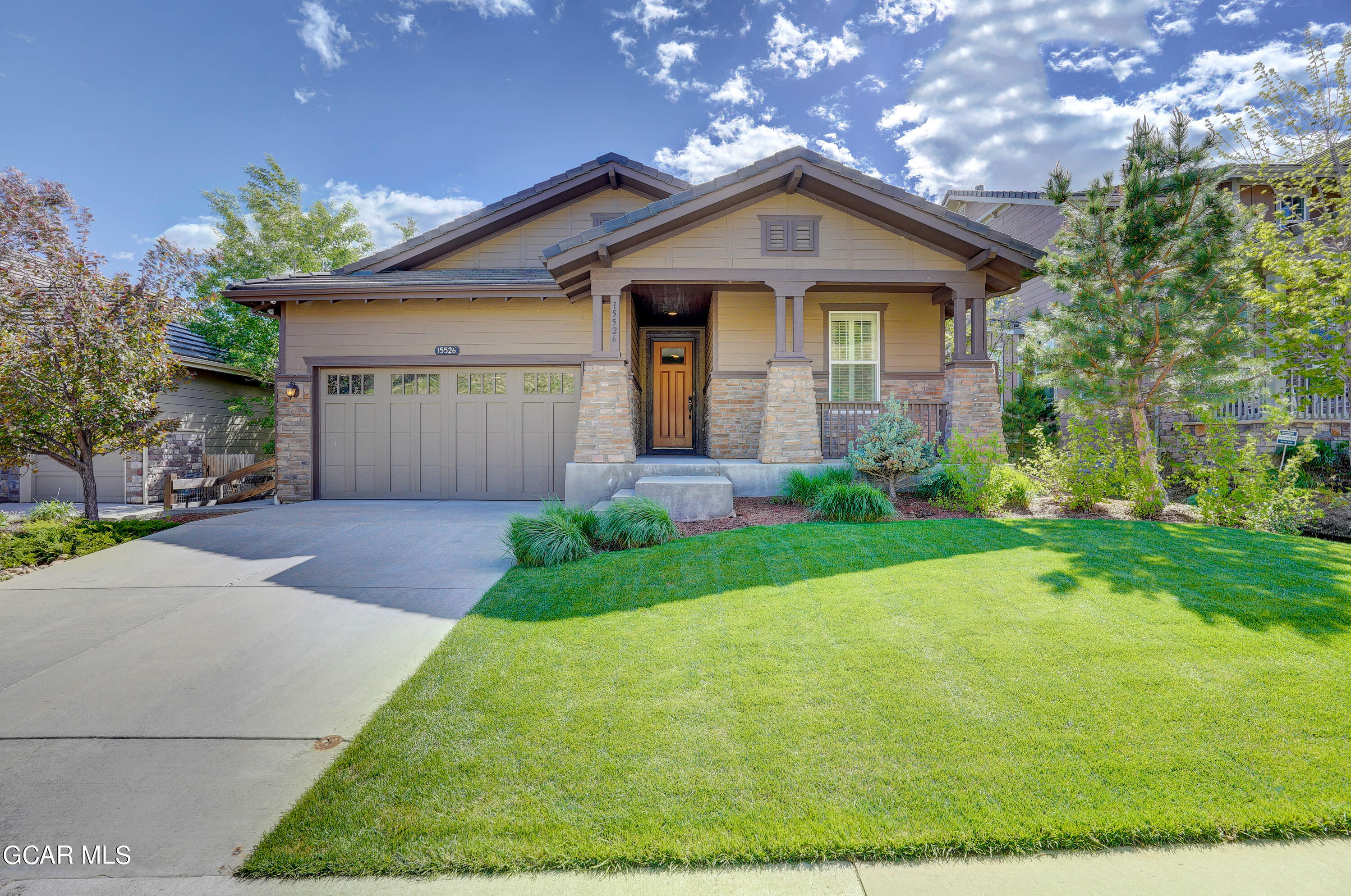 15526 Red Deer Drive Morrison, CO 80465 - Photo 10 of 82 a front view of a house with garden