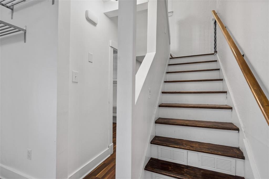 1534 McFarland Road Pittsburgh, PA 15216 - Photo 12 of 36 a view of staircase with wooden floor