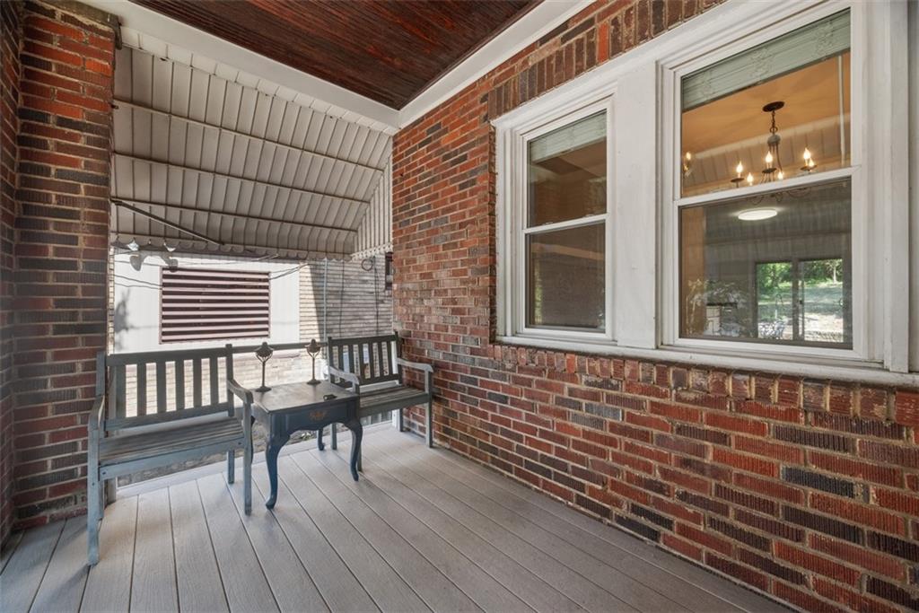 1534 McFarland Road Pittsburgh, PA 15216 - Photo 3 of 36 a balcony with table and chairs