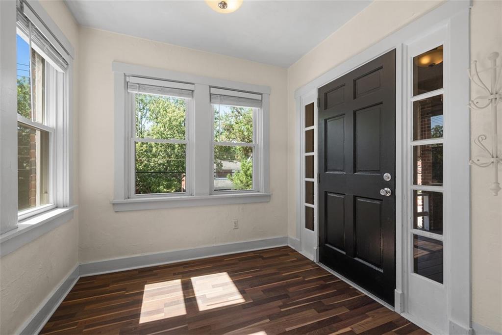 1534 McFarland Road Pittsburgh, PA 15216 - Photo 4 of 36 wooden floor in an empty room with a window