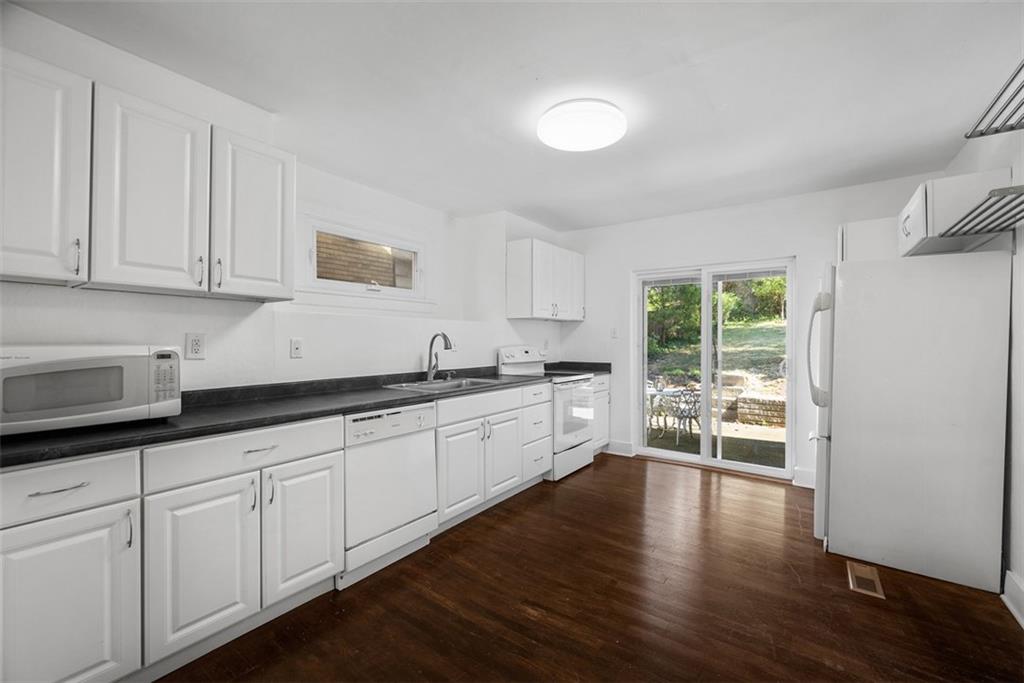 1534 McFarland Road Pittsburgh, PA 15216 - Photo 8 of 36 a kitchen with sink and cabinets