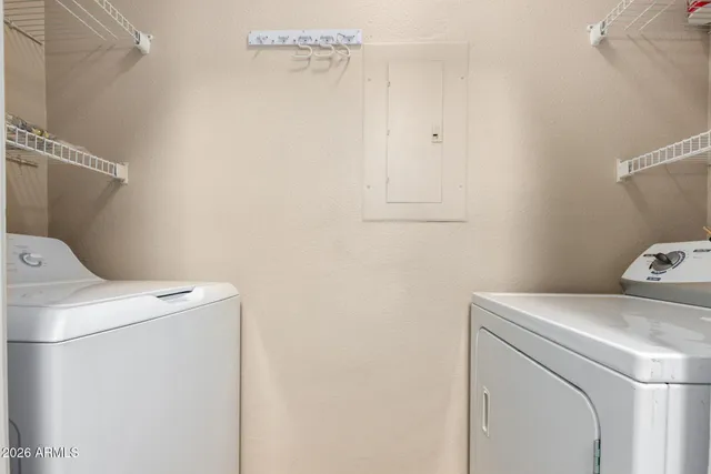 a utility room with dryer and washer