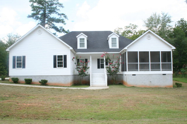 111 Browning Pointe Road Macon, GA 31216 - Photo 1 of 1 a front view of a house with a yard