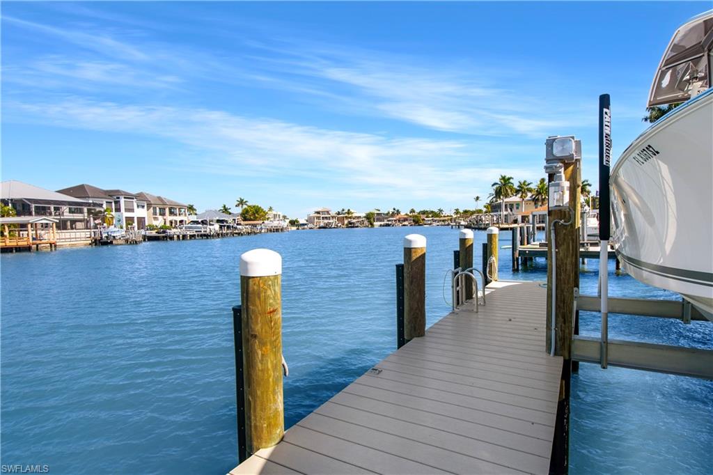 190 Tahiti Circle Naples, FL 34113 - Photo 25 of 32 a view of a balcony with ocean view
