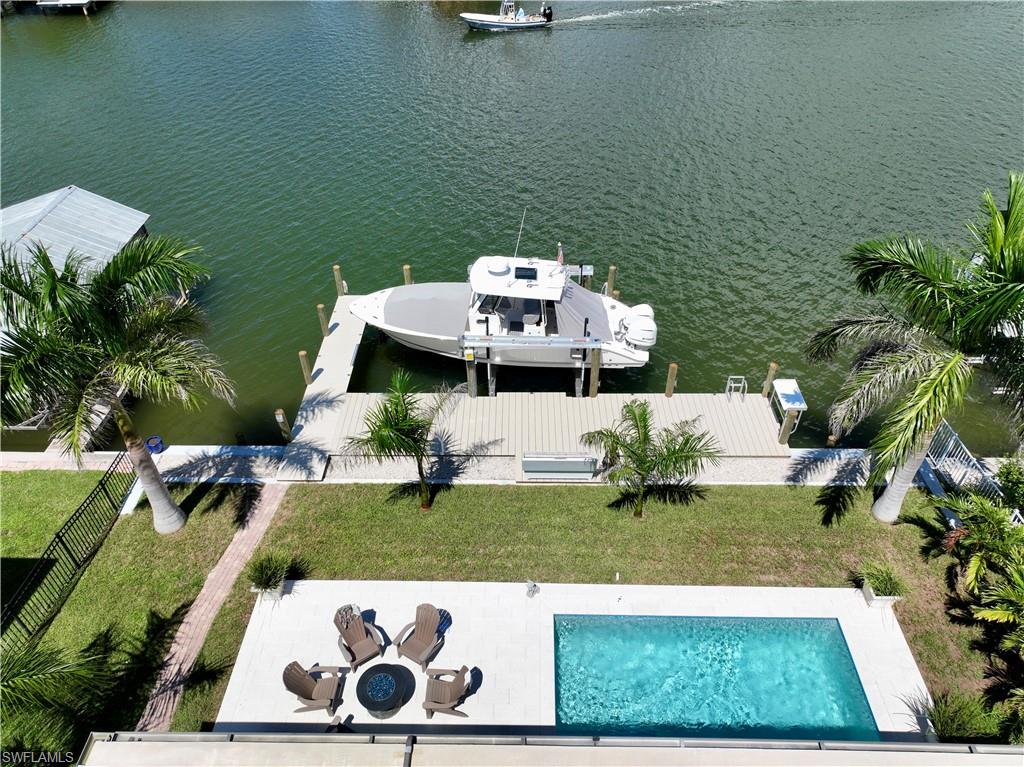 190 Tahiti Circle Naples, FL 34113 - Photo 27 of 32 a view of a house with a yard