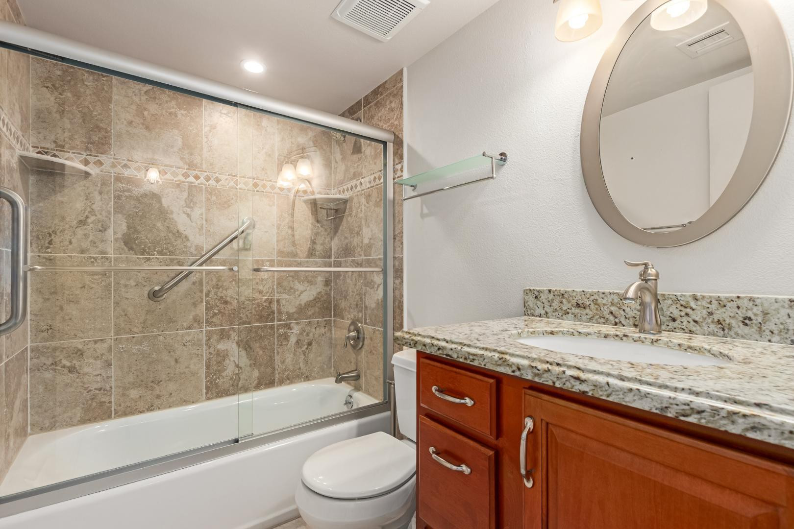 7436 East Chaparral Road, Unit B213 Scottsdale, AZ 85250 - Photo 13 of 27 a bathroom with a granite countertop sink toilet and shower