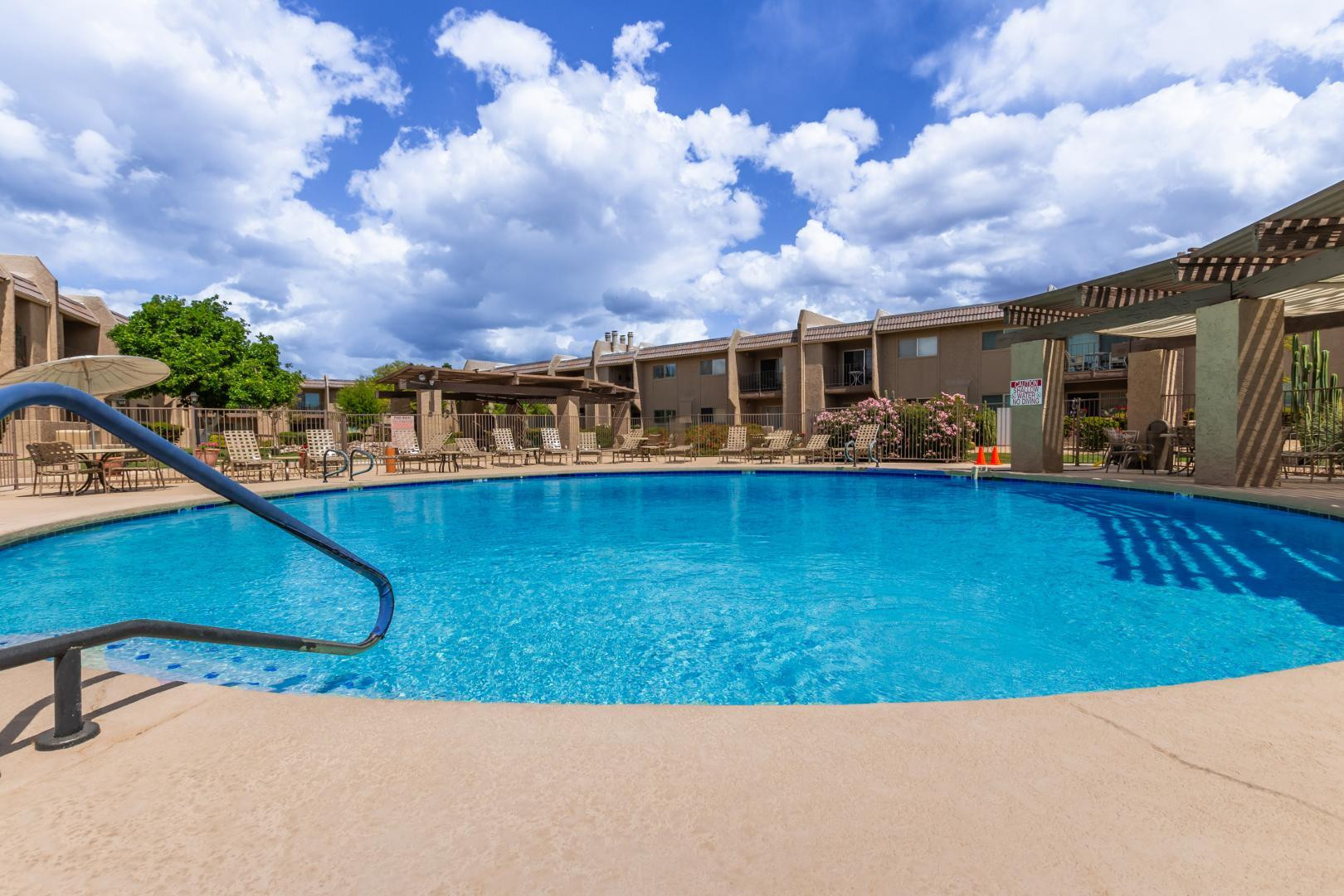 7436 East Chaparral Road, Unit B213 Scottsdale, AZ 85250 - Photo 21 of 27 a view of a yard with a sitting space