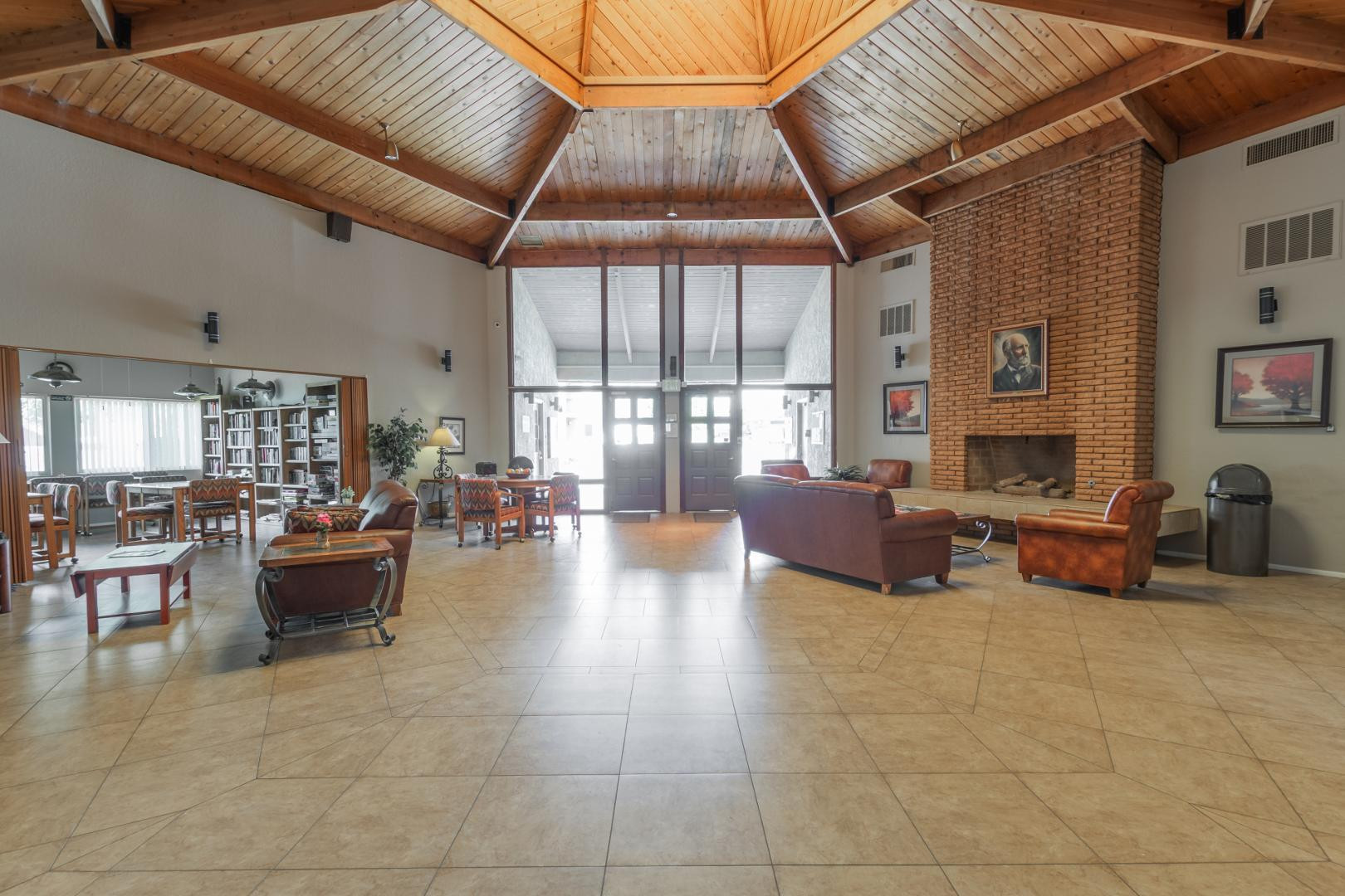 7436 East Chaparral Road, Unit B213 Scottsdale, AZ 85250 - Photo 25 of 27 a living room with furniture and a fireplace