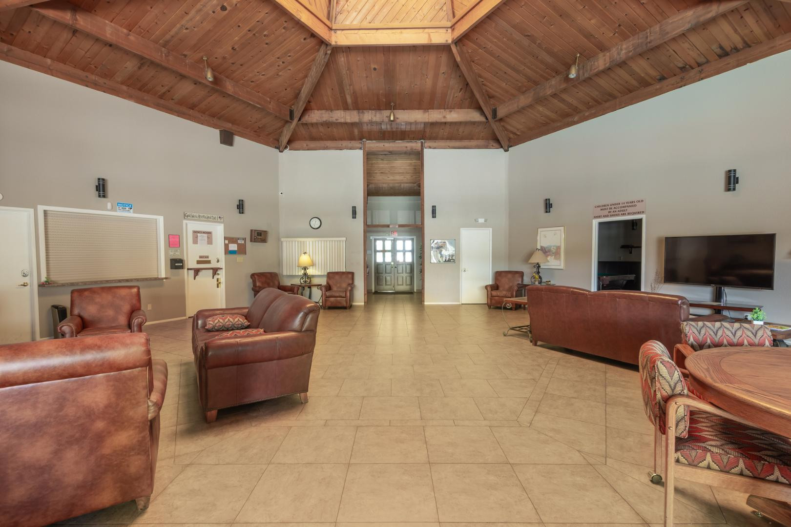 7436 East Chaparral Road, Unit B213 Scottsdale, AZ 85250 - Photo 26 of 27 a living room with furniture and a flat screen tv