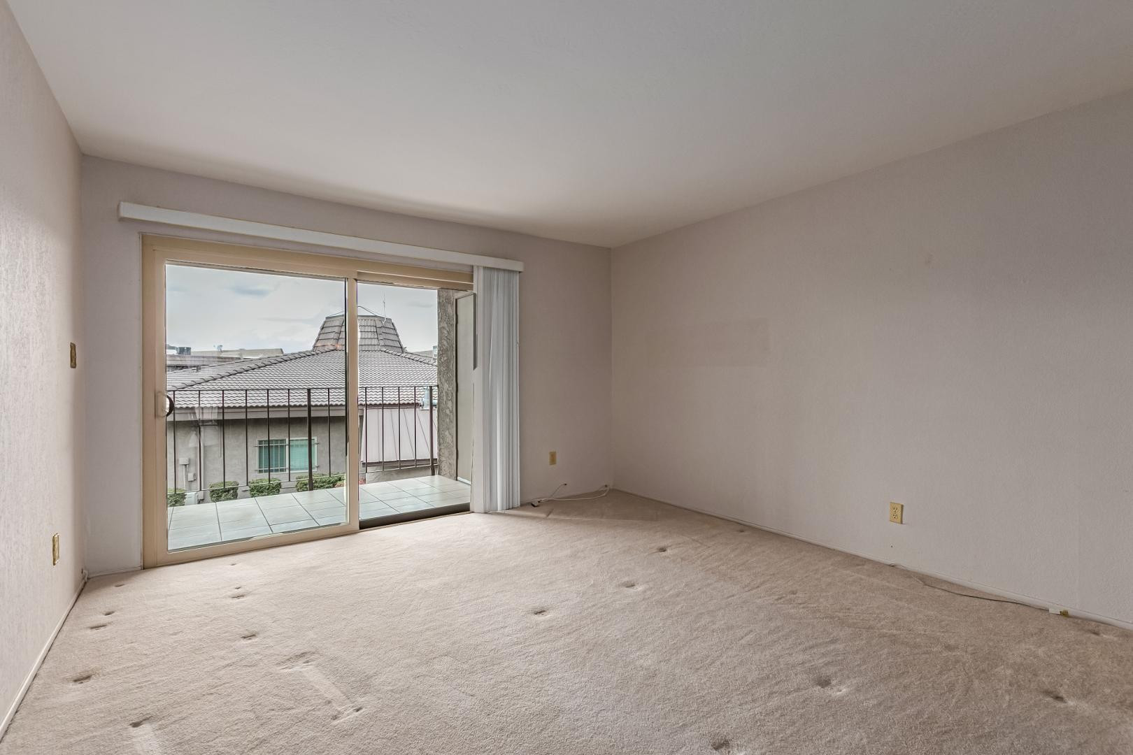 7436 East Chaparral Road, Unit B213 Scottsdale, AZ 85250 - Photo 5 of 27 a view of an empty room with a window