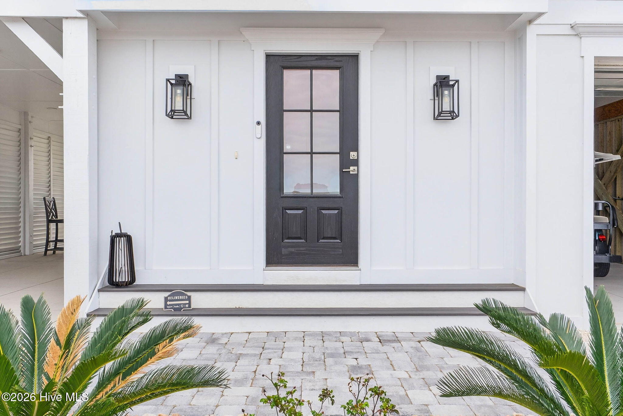 1416 Riverside Drive Sunset Beach, NC 28468 - Photo 75 of 83 Welcoming front entrance with coastal architecture and clean modern design in this Sunset Beach home.