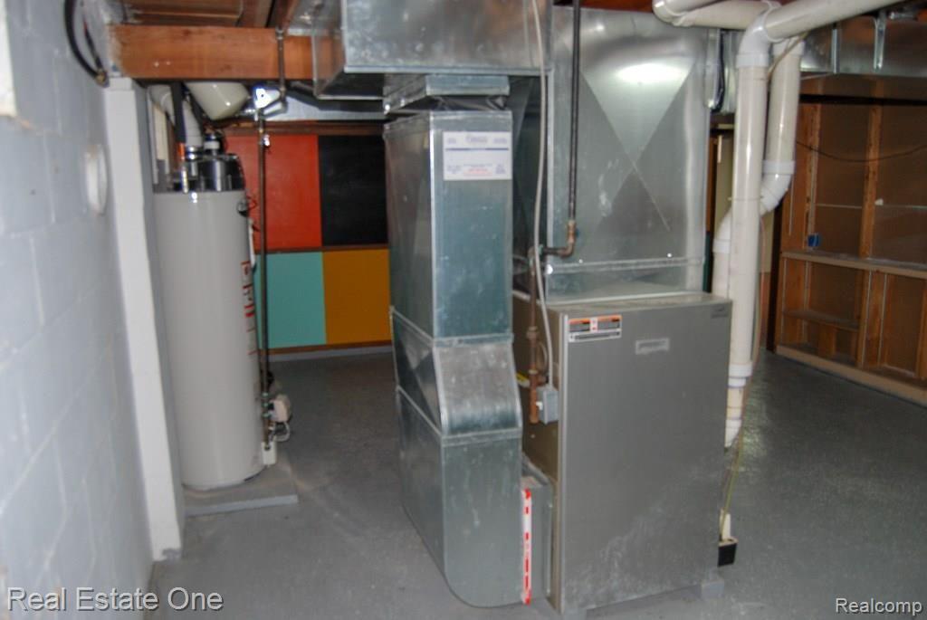 79995 Van Dyke Road Romeo, MI 48065 - Photo 41 of 58 Utility room with extra storage