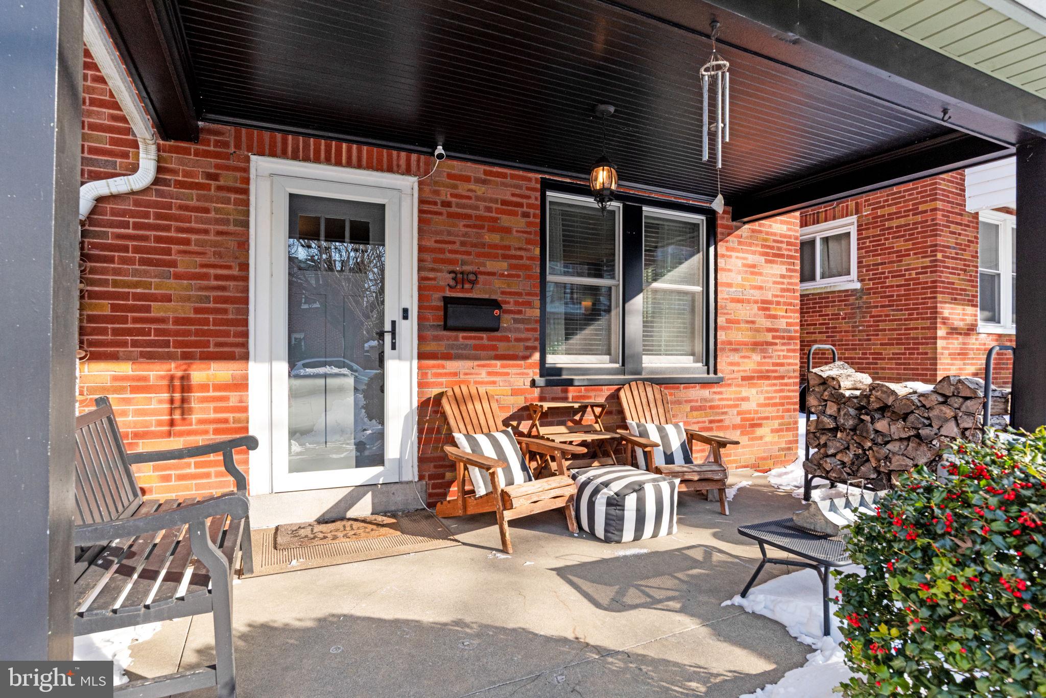319 North Reservoir Street Lancaster, PA 17602 - Photo 2 of 44 a view of a patio with table and chairs and potted plants