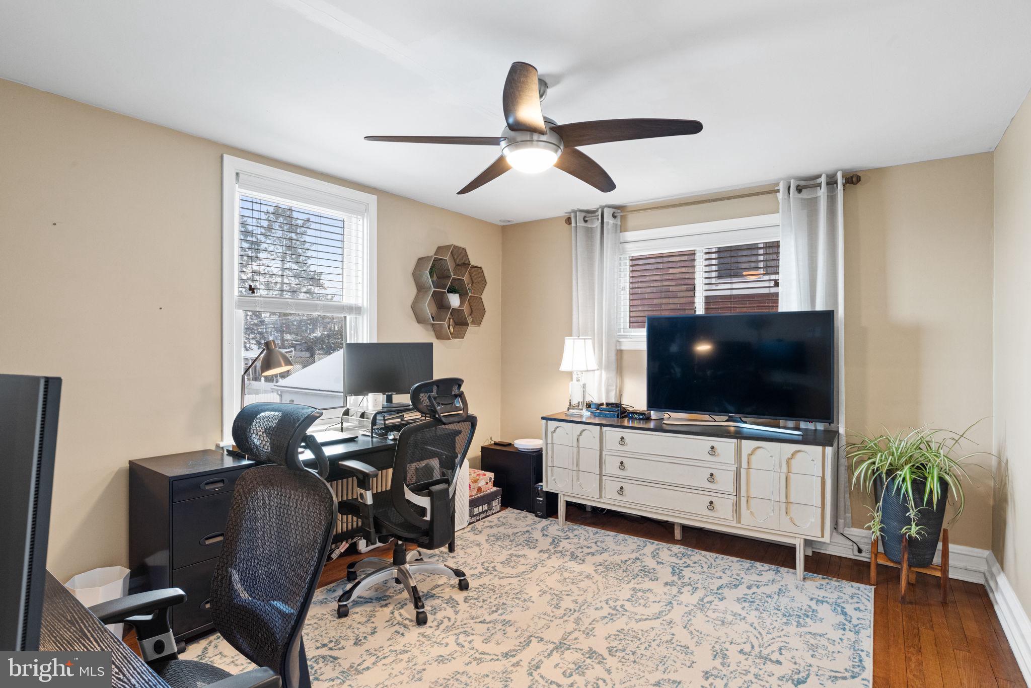 319 North Reservoir Street Lancaster, PA 17602 - Photo 25 of 44 a living room with furniture and a flat screen tv