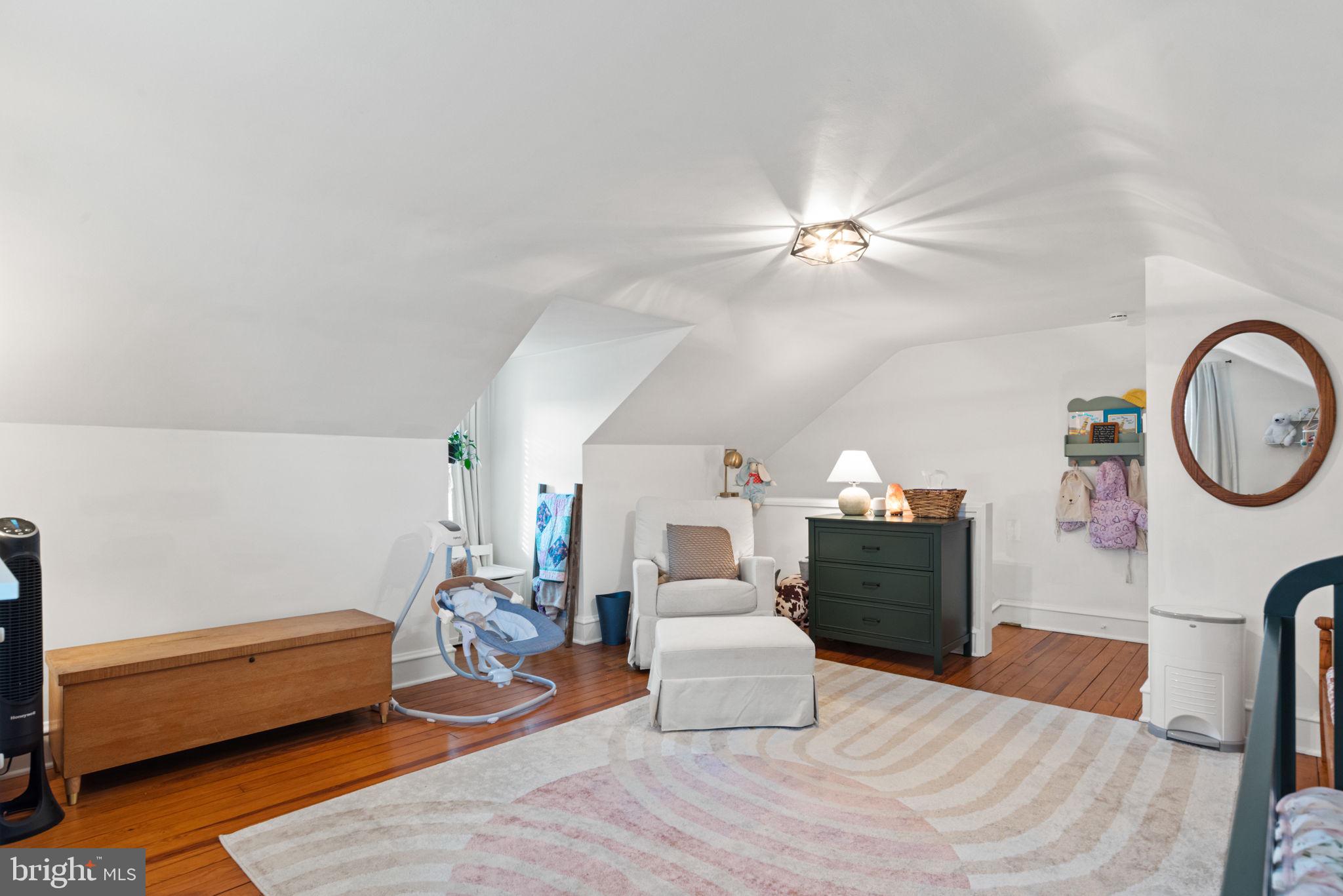 319 North Reservoir Street Lancaster, PA 17602 - Photo 28 of 44 a living room with furniture and a chandelier