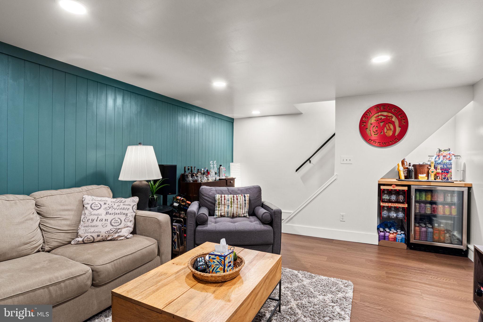 319 North Reservoir Street Lancaster, PA 17602 - Photo 33 of 44 a living room with furniture and a wooden floor