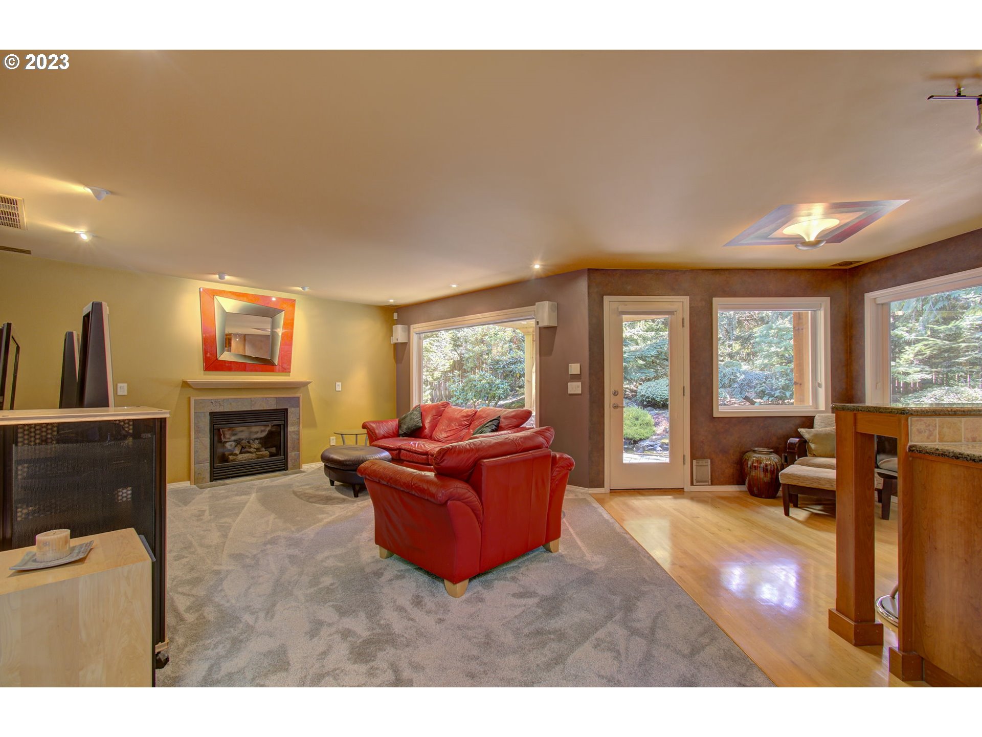 2407 Northeast 165th Street Ridgefield, WA 98642 - Photo 15 of 46 a living room with furniture window and fireplace