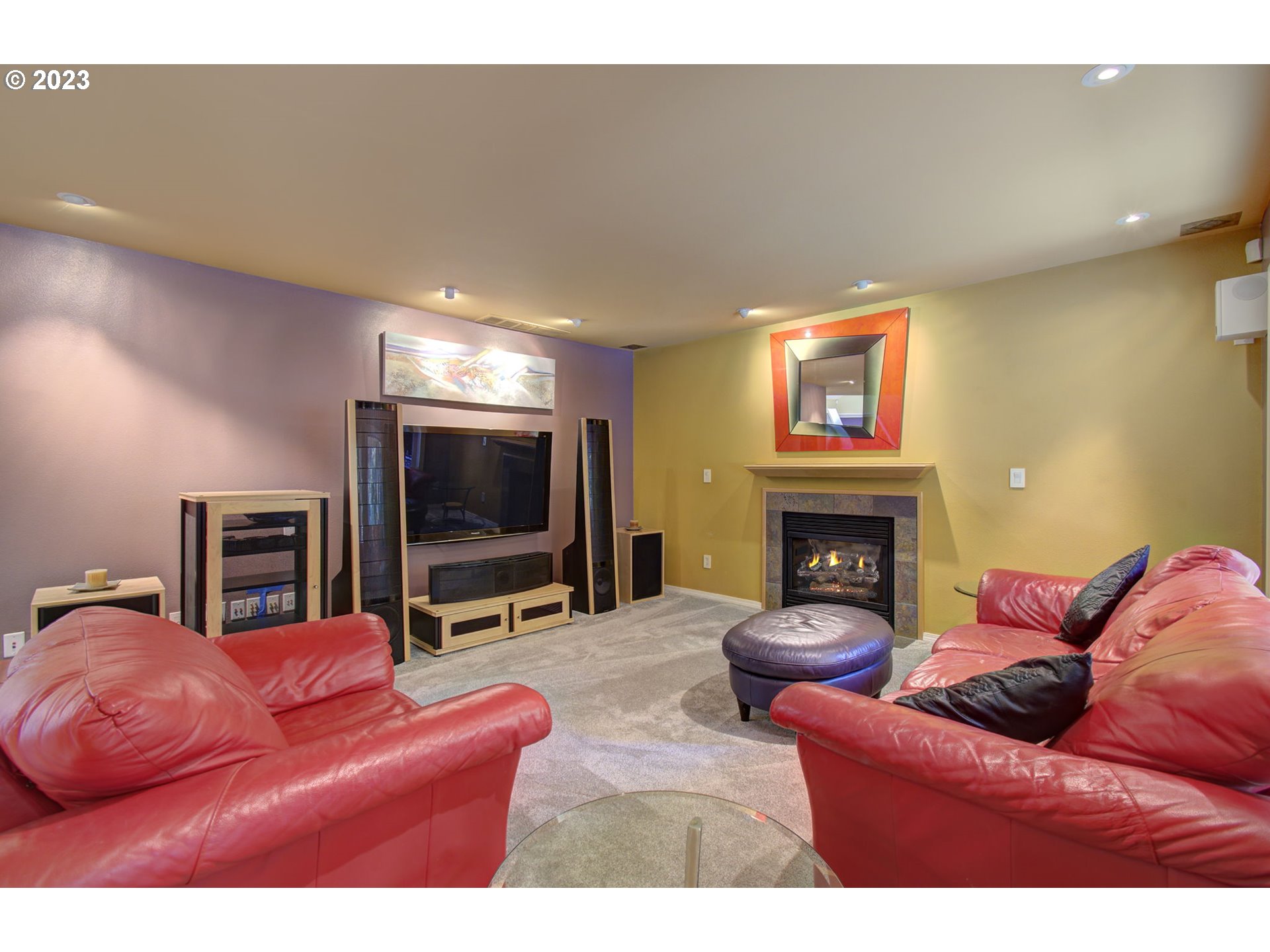 2407 Northeast 165th Street Ridgefield, WA 98642 - Photo 18 of 46 a living room with furniture and a flat screen tv
