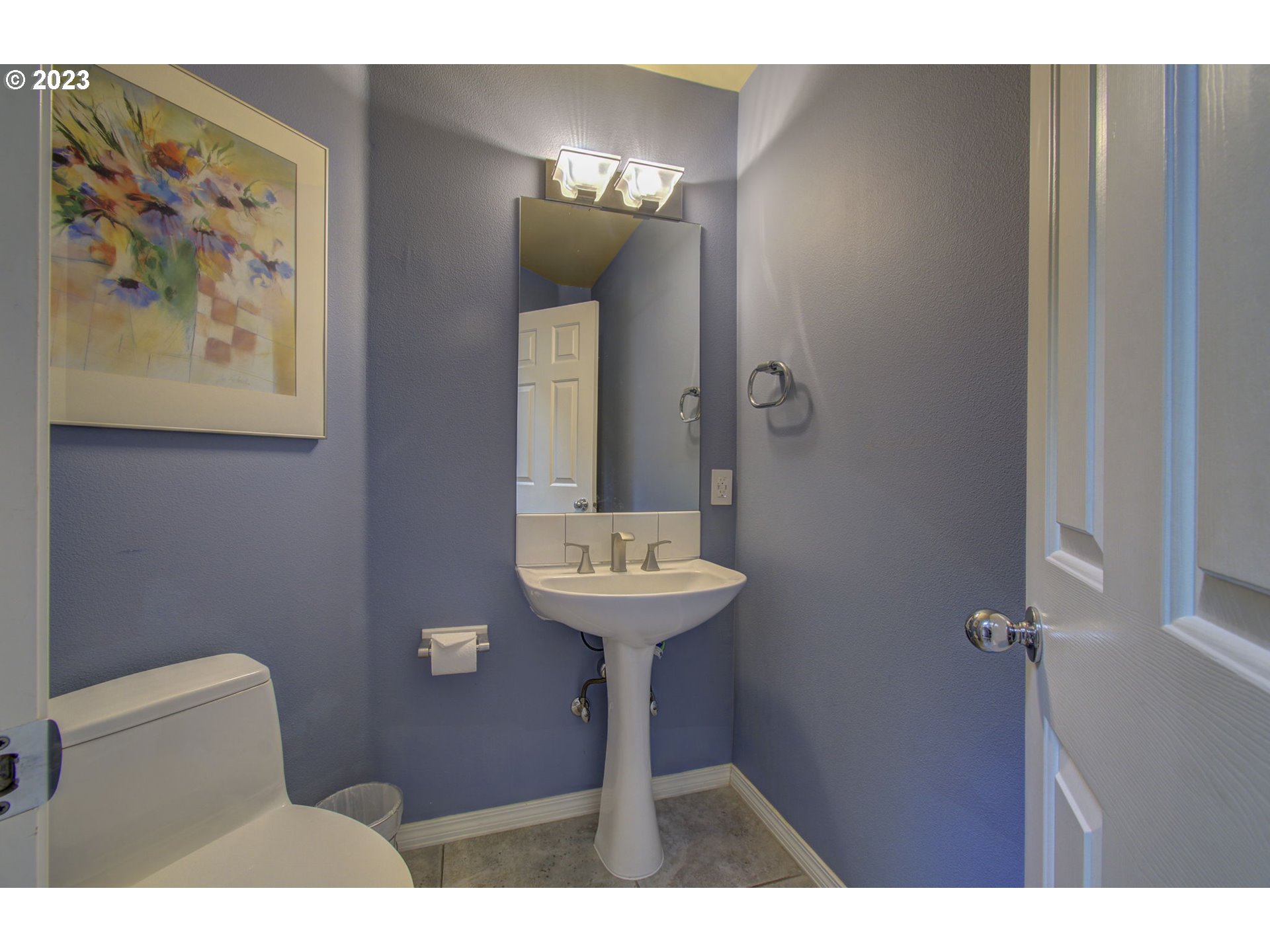 2407 Northeast 165th Street Ridgefield, WA 98642 - Photo 21 of 46 a bathroom with a toilet sink and mirror