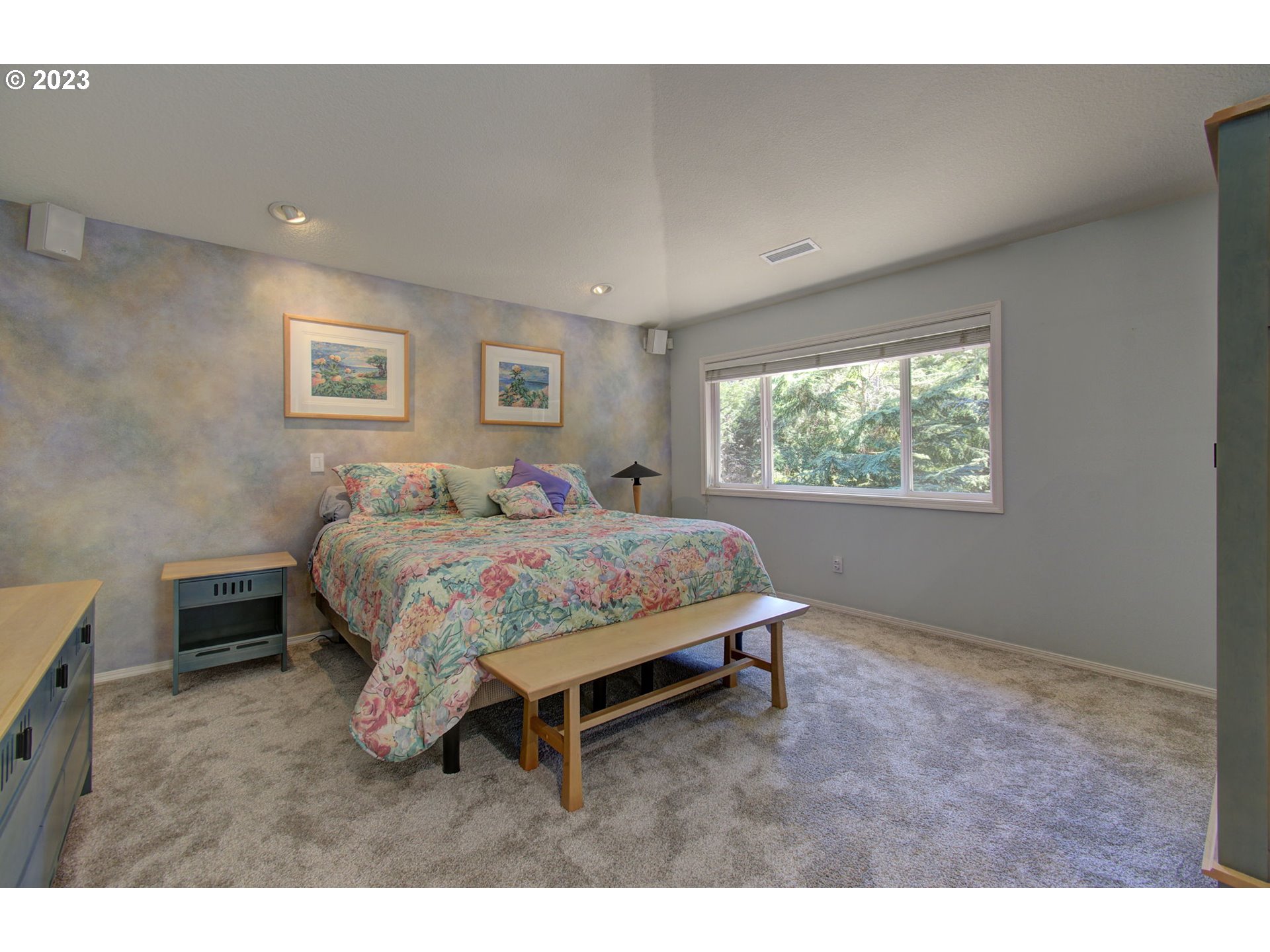 2407 Northeast 165th Street Ridgefield, WA 98642 - Photo 23 of 46 a bedroom with a bed and a window