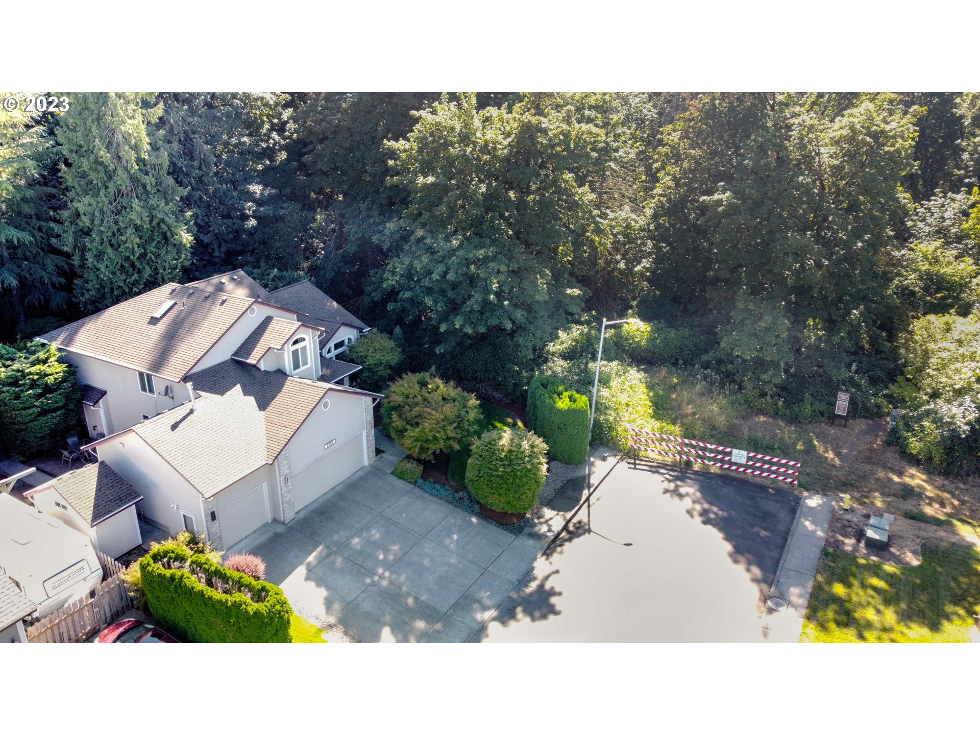 2407 Northeast 165th Street Ridgefield, WA 98642 - Photo 41 of 46 a picture of a house with a yard