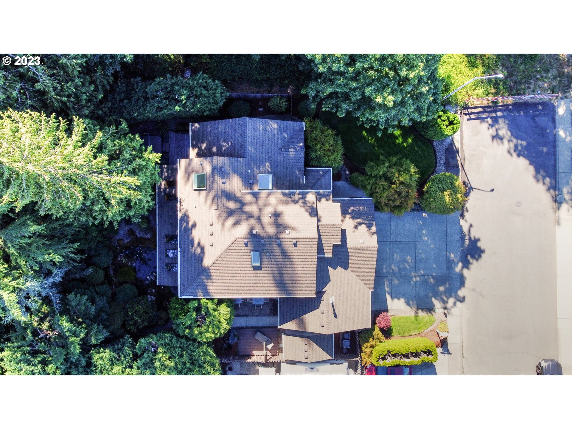 2407 Northeast 165th Street Ridgefield, WA 98642 - Photo 43 of 46 an aerial view of a house with a garden