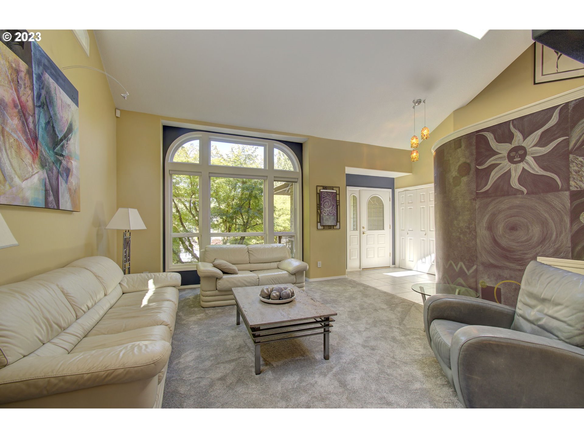 2407 Northeast 165th Street Ridgefield, WA 98642 - Photo 6 of 46 a living room with furniture and a large window