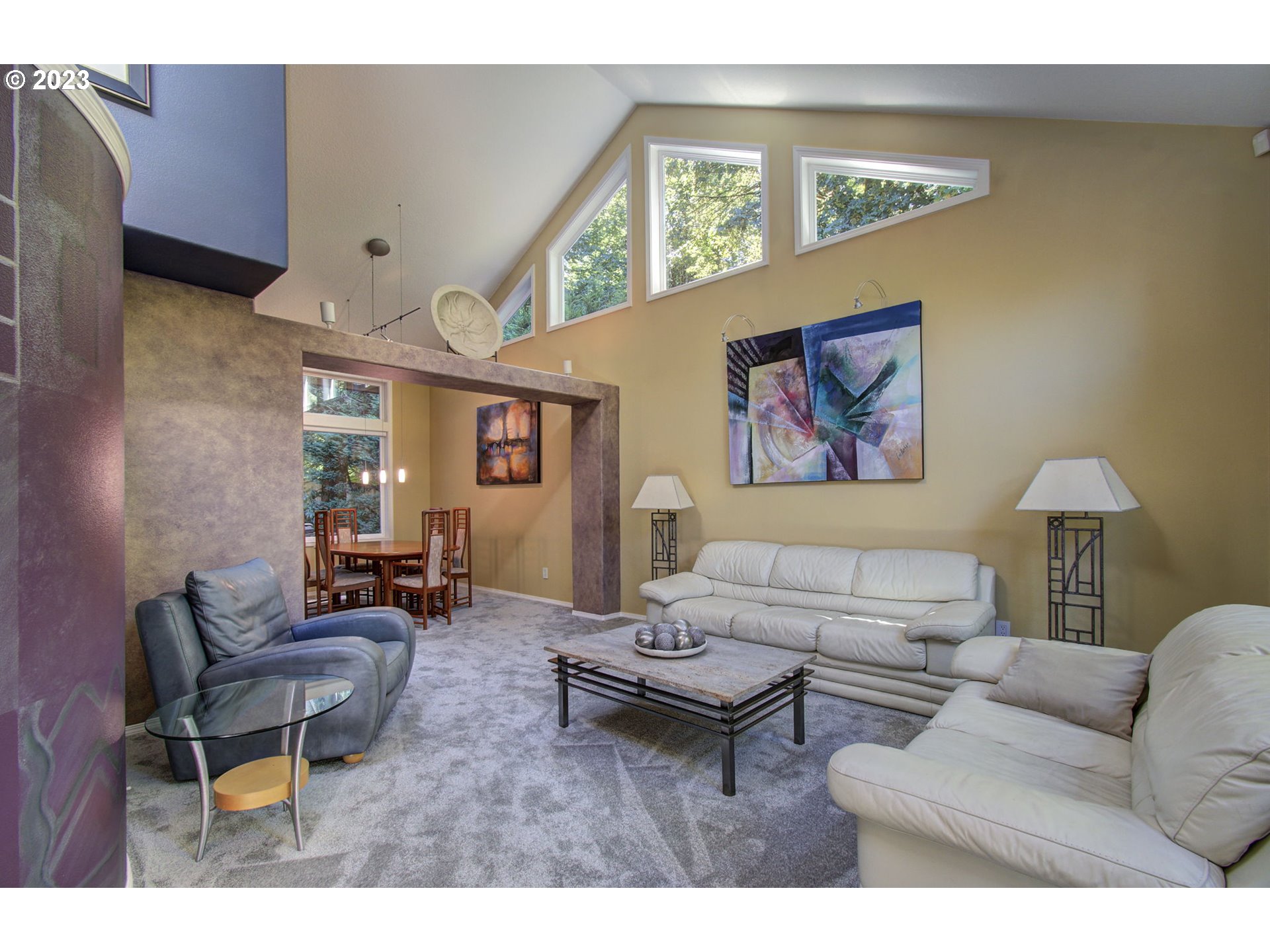2407 Northeast 165th Street Ridgefield, WA 98642 - Photo 7 of 46 a living room with furniture and a large window