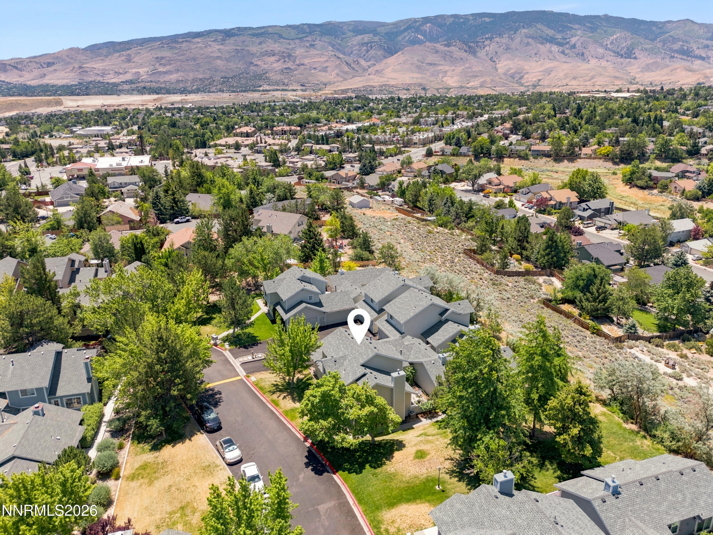 1899 Tuolumne Drive Reno, NV 89523 - Photo 40 of 44 an aerial view of a city with lots of residential buildings