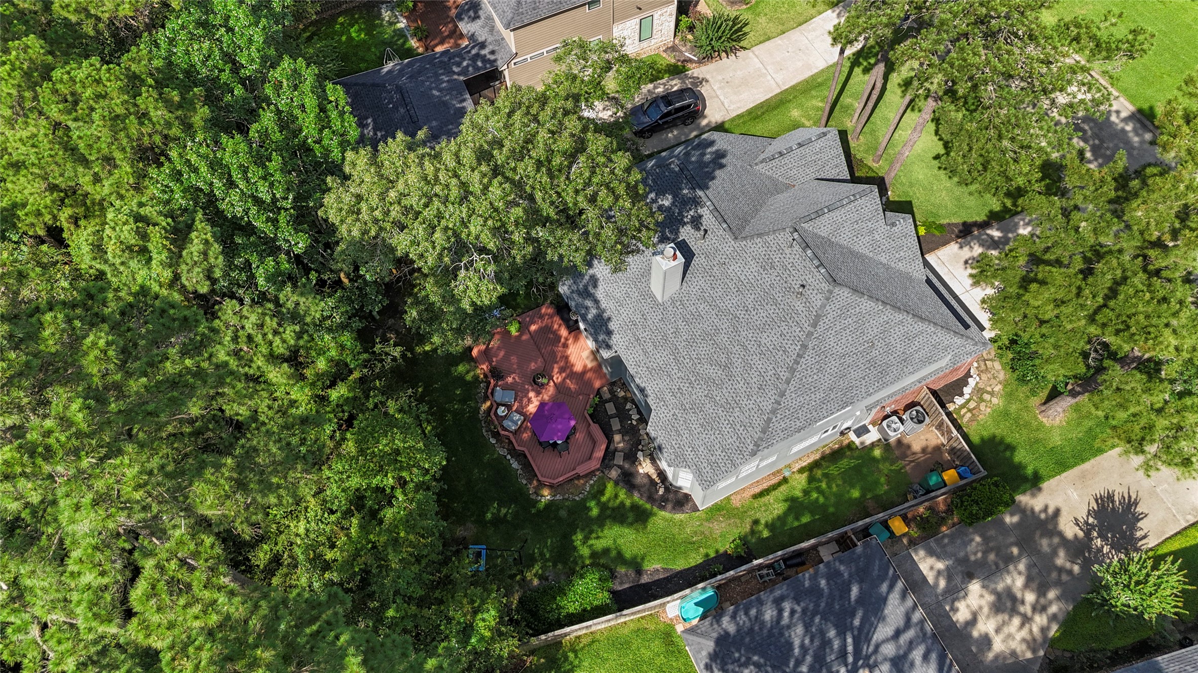 102 Treescape Circle Spring, TX 77381 - Photo 32 of 40 The property is nestled in a serene neighborhood with mature trees providing ample shade and privacy.