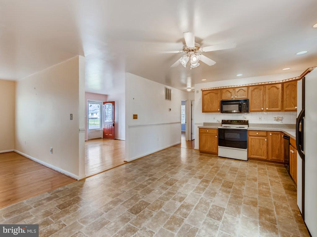 1407 Kent Road Essex, MD 21221 - Photo 4 of 22 Both rooms enter into this Large Kitchen