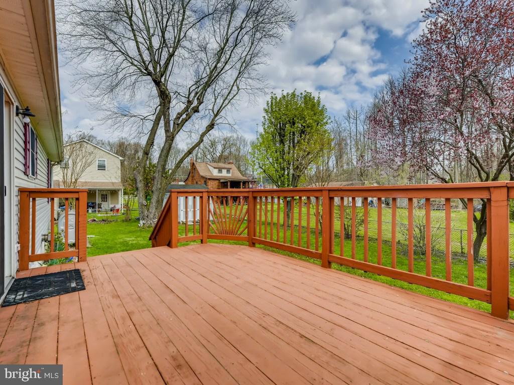 1407 Kent Road Essex, MD 21221 - Photo 6 of 22 and the Deck opens to the fenced back yard