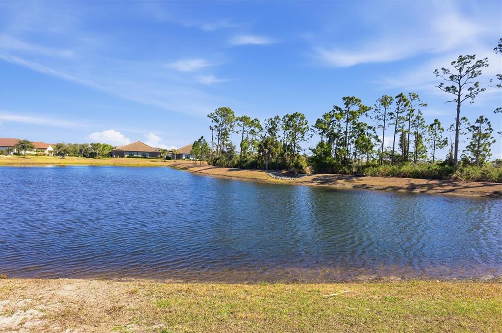 216 Brienza Loop Nokomis, FL 34275 - Photo 34 of 58 a view of a lake