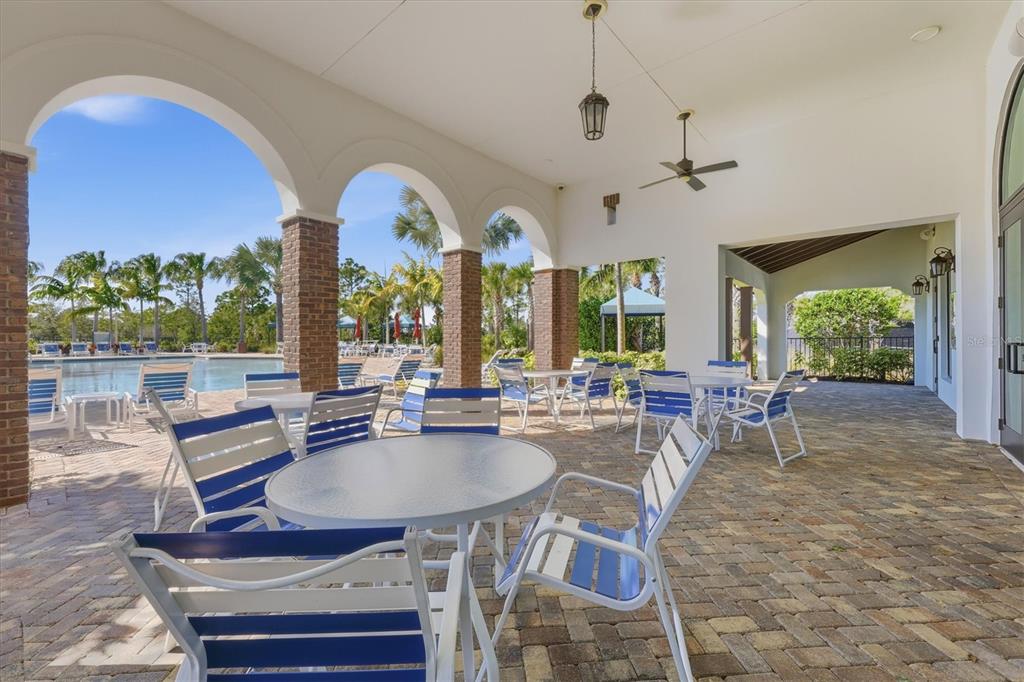 216 Brienza Loop Nokomis, FL 34275 - Photo 43 of 58 a view of a dining room with furniture window and outside view