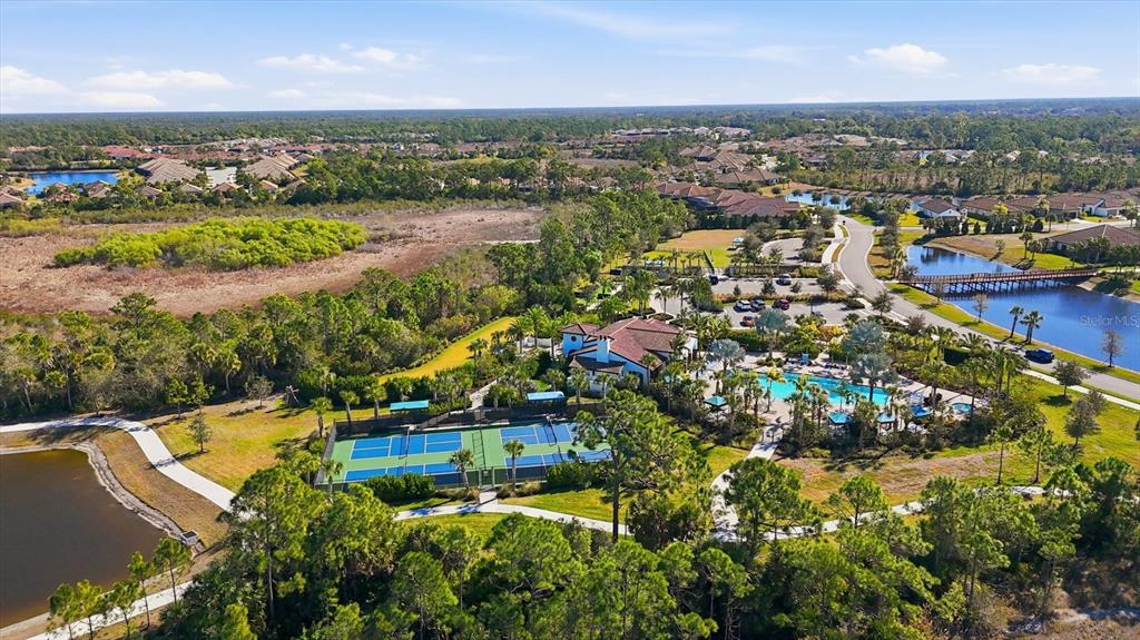 216 Brienza Loop Nokomis, FL 34275 - Photo 56 of 58 an aerial view of residential houses with outdoor space