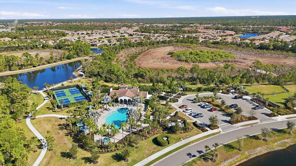 216 Brienza Loop Nokomis, FL 34275 - Photo 58 of 58 an aerial view of residential houses with outdoor space