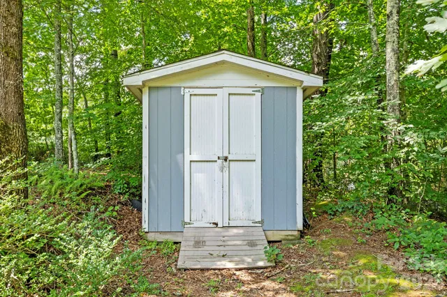 a backyard of a house with seating space