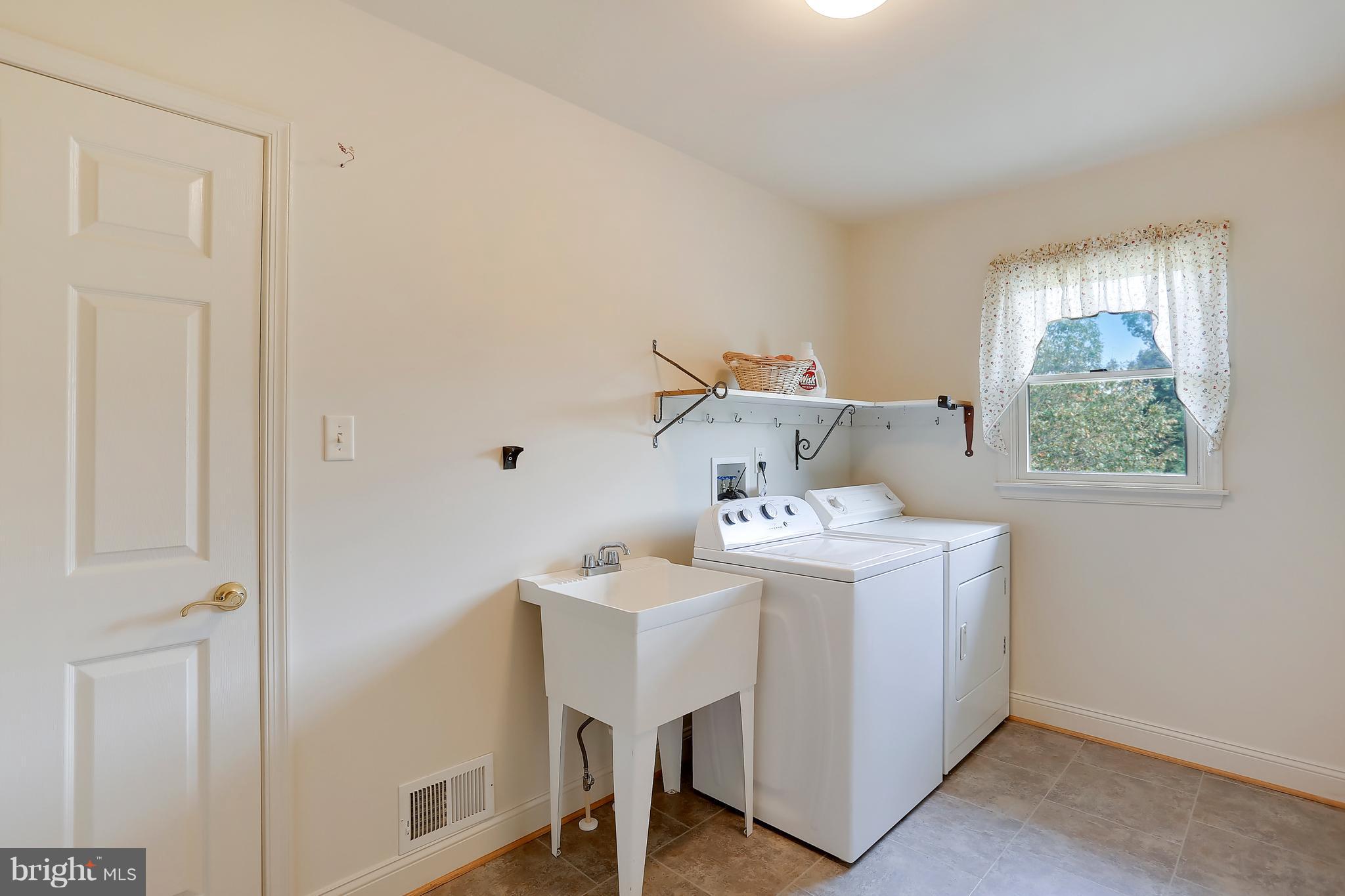 24500 Stringtown Road Clarksburg, MD 20871 - Photo 16 of 30 LAUNDRY ROOM OFF KITCHEN