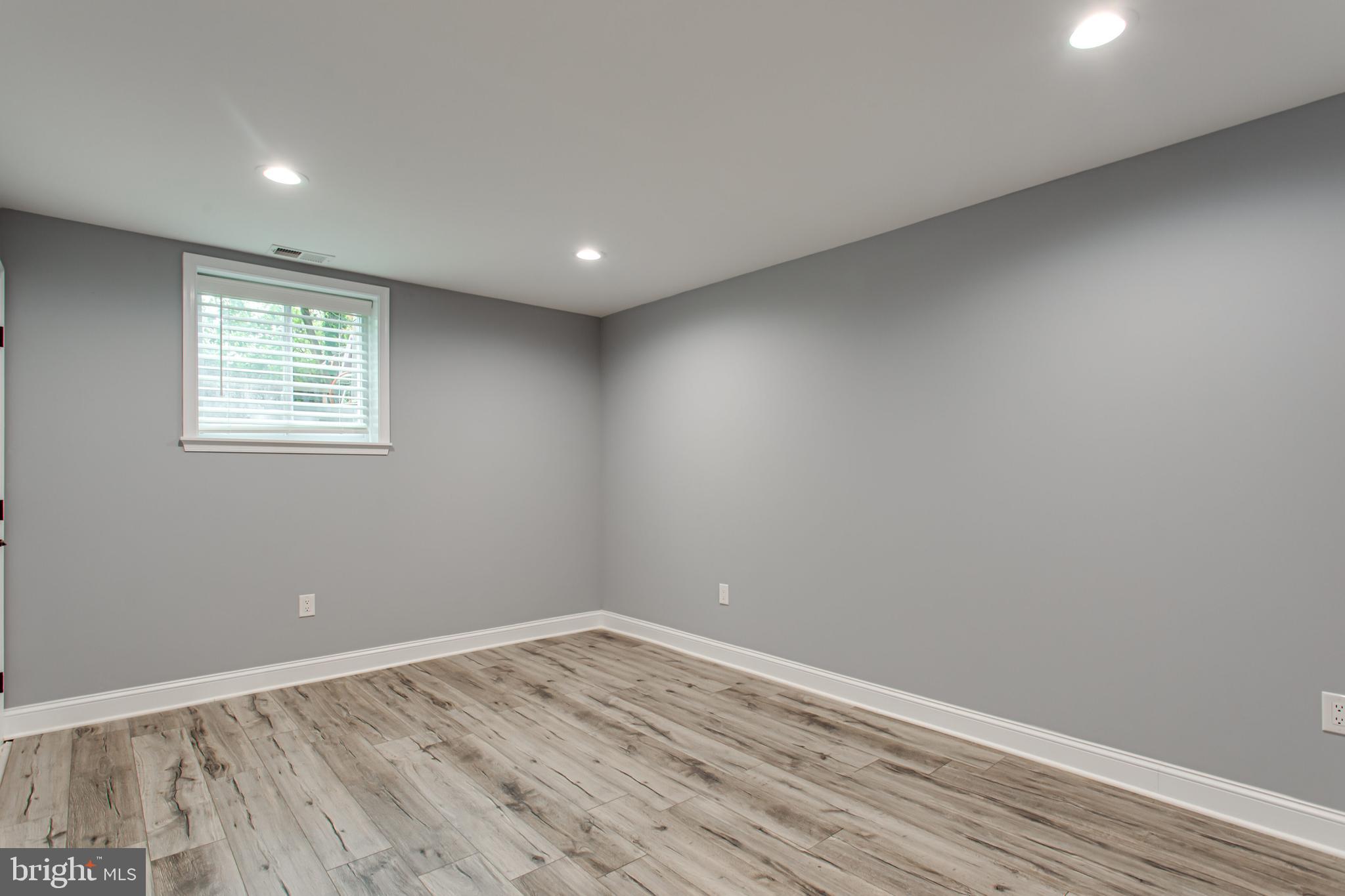 43840 Tarrywyle Way Leonardtown, MD 20650 - Photo 35 of 41 a view of empty room with wooden floor and fan