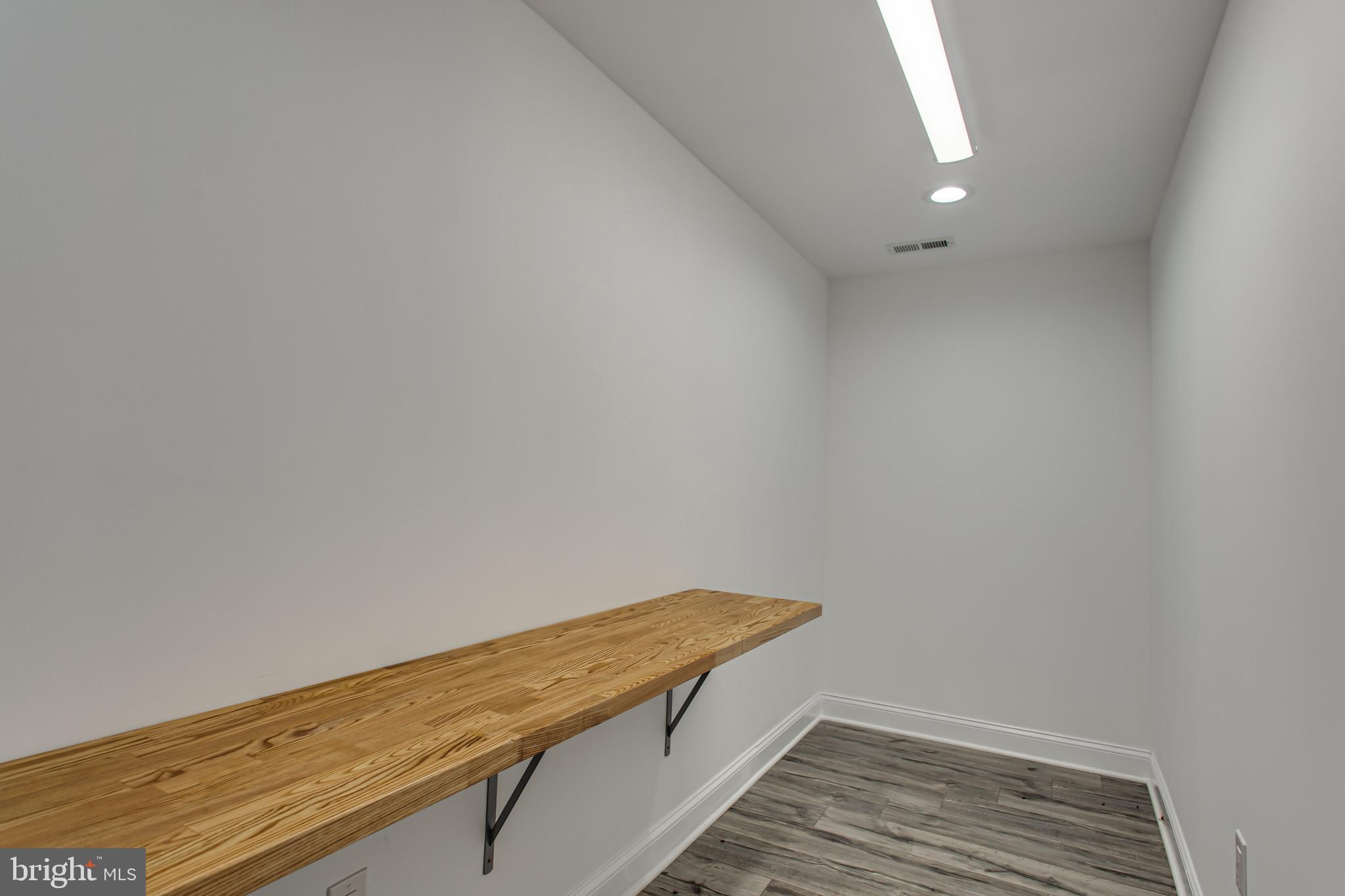 43840 Tarrywyle Way Leonardtown, MD 20650 - Photo 37 of 41 a view of a room with wooden floor