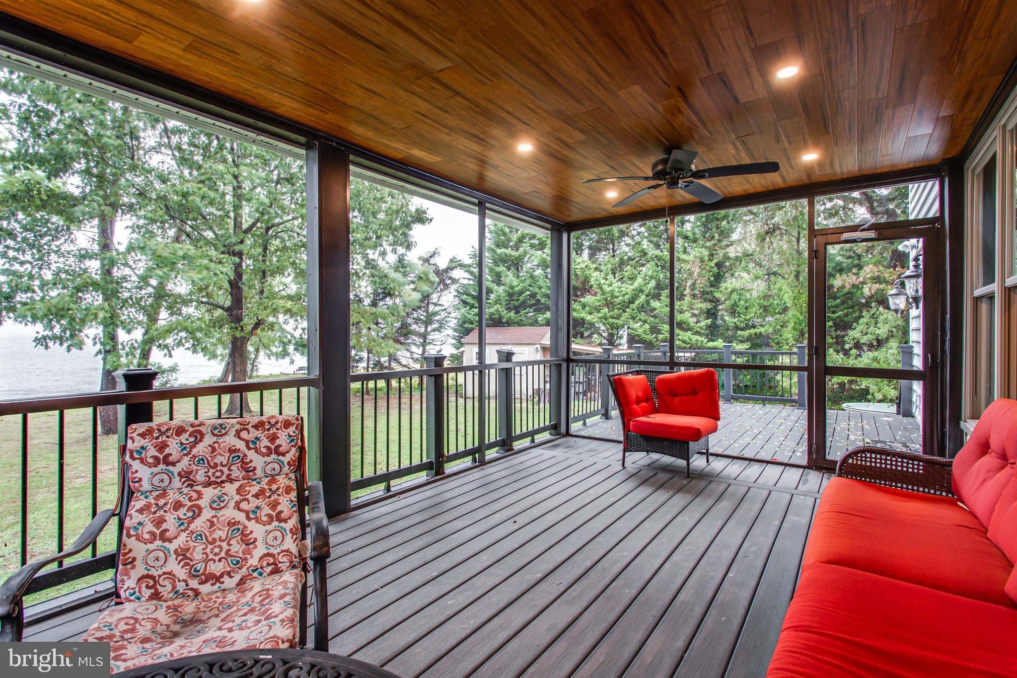 43840 Tarrywyle Way Leonardtown, MD 20650 - Photo 40 of 41 a balcony with chairs and wooden floor