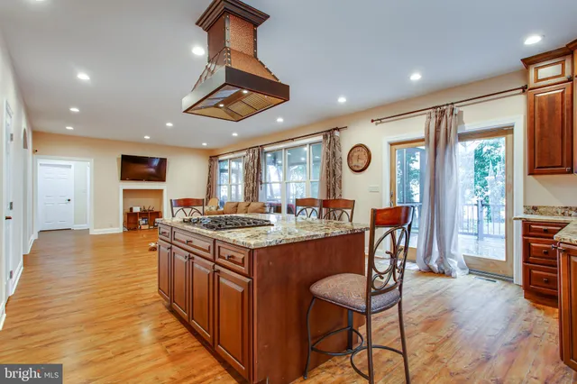 a view of room with wooden floor and window