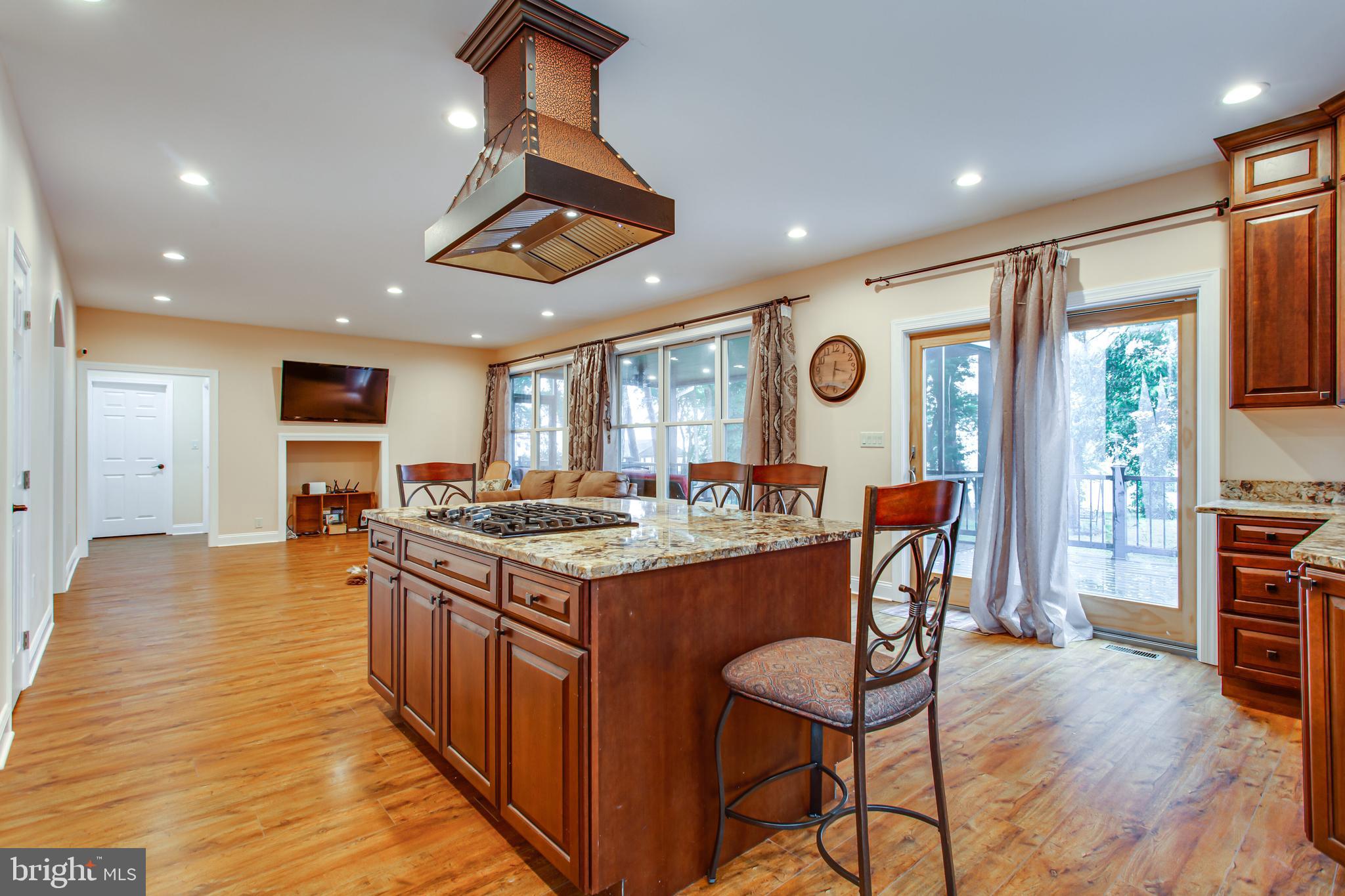 43840 Tarrywyle Way Leonardtown, MD 20650 - Photo 7 of 41 a open kitchen with stainless steel appliances granite countertop a stove and refrigerator