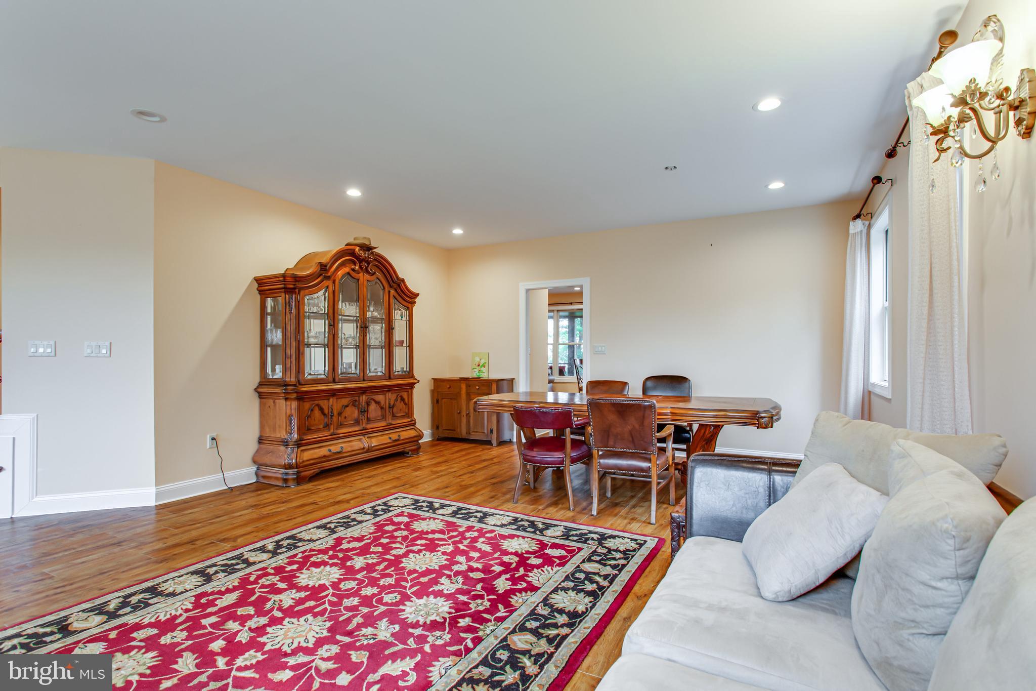 43840 Tarrywyle Way Leonardtown, MD 20650 - Photo 10 of 41 a living room with furniture a rug and a window