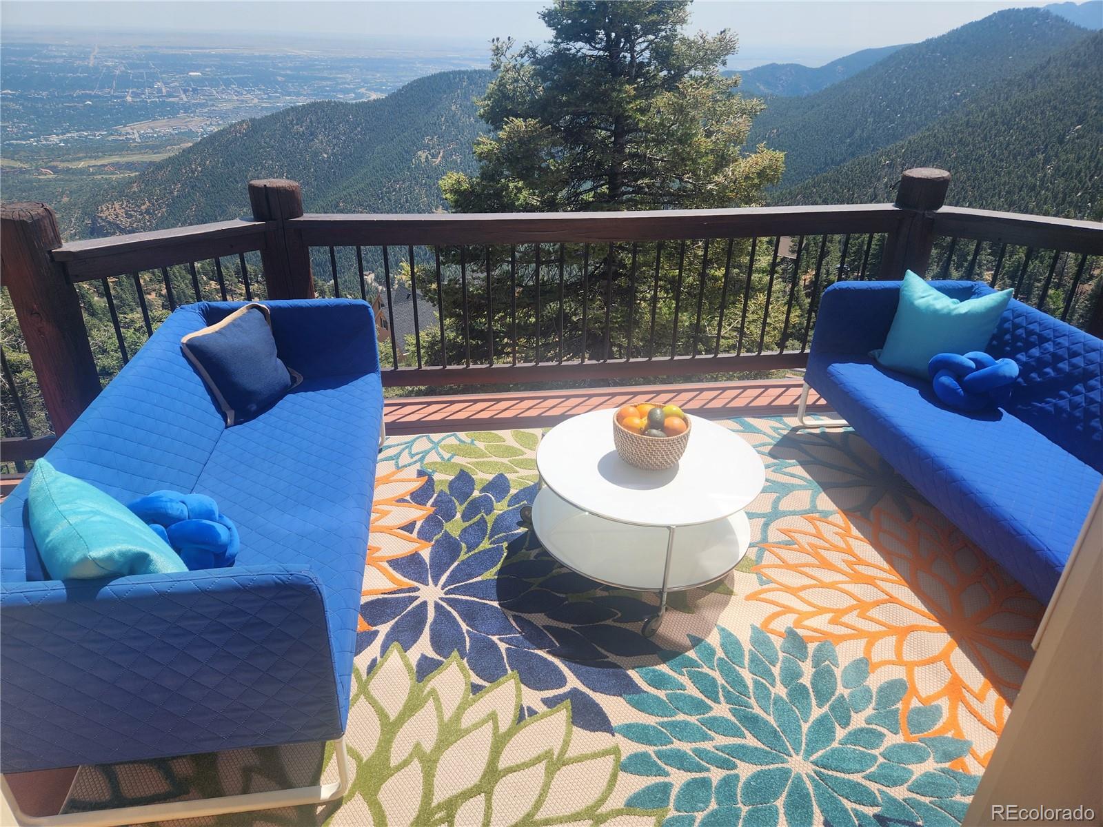 570 Upper Vista Road Manitou Springs, CO 80829 - Photo 12 of 36 a balcony with outdoor seating