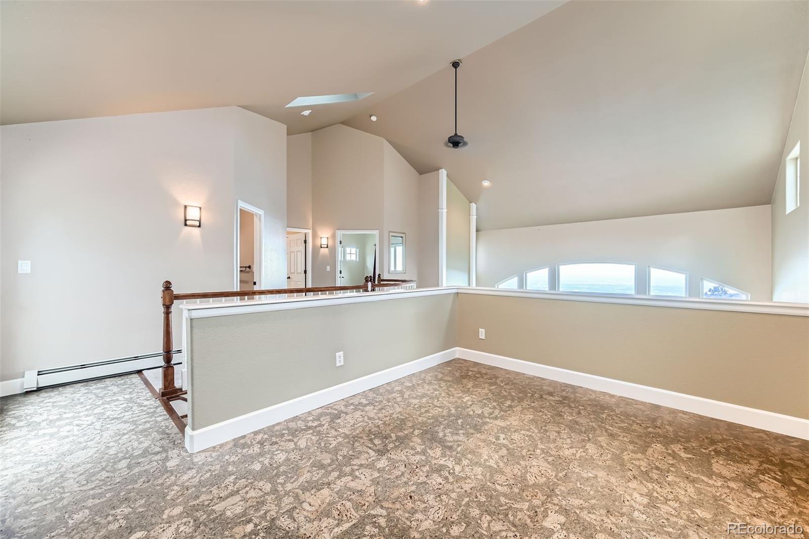 570 Upper Vista Road Manitou Springs, CO 80829 - Photo 29 of 36 a view of a kitchen with a sink and a window
